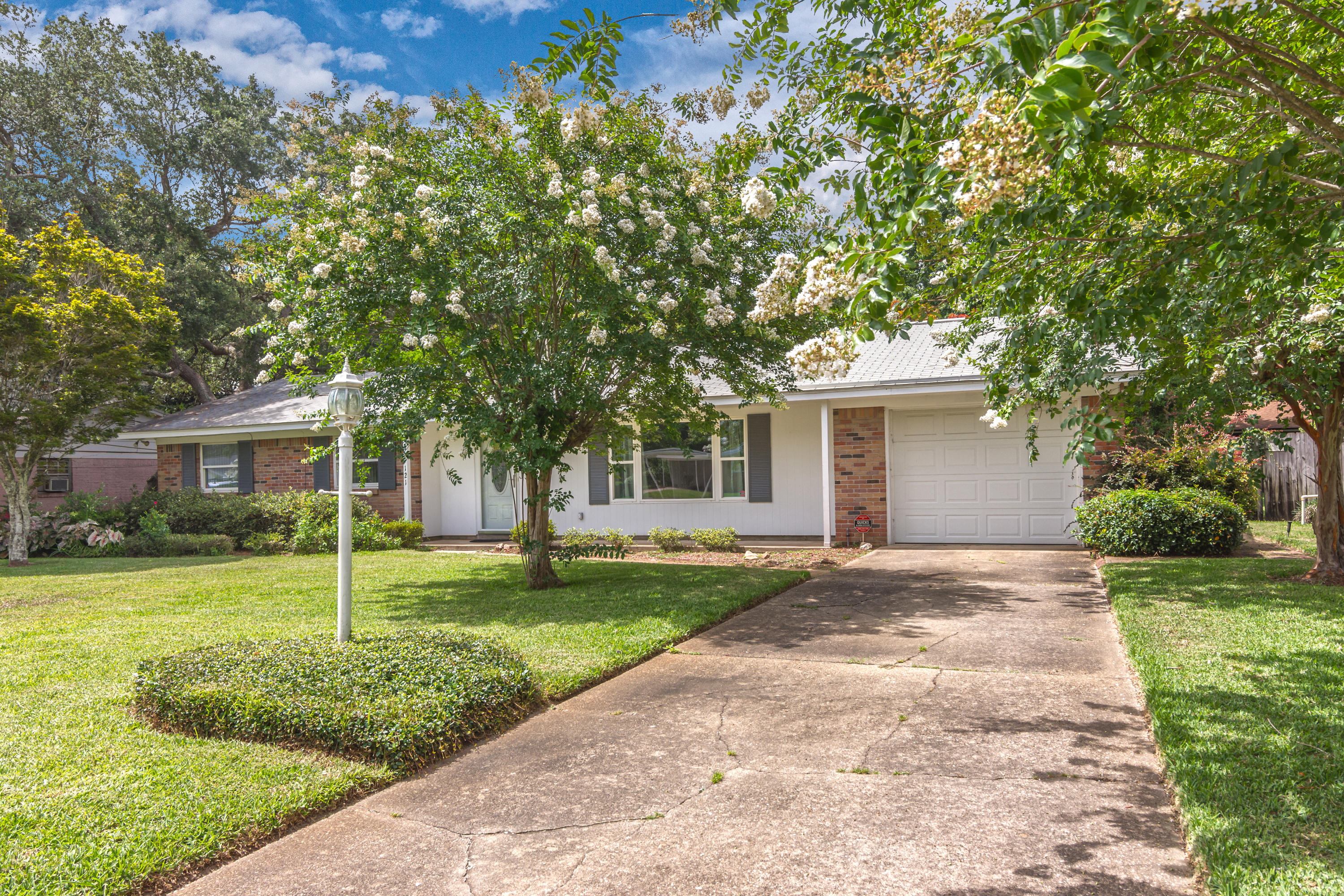 Your backyard oasis awaits you! This adorable 3 bedroom, 2 bathroom home in the heart of Fort Walton Beach has been lovingly cared for, and it shows. Walking in, the home is light and bright, featuring newer carpet, neutral paint, and an updated kitchen. Moving outdoors, there is not a patio more perfect for gathering and entertaining. A large covered space looks over a lush, manicured lawn with a beautiful garden. Completely move-in ready, schedule your appointment today!