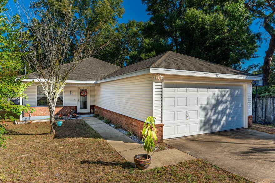 Don't miss this beautiful place to call home in the heart of Crestview!!! This 4 bed 2 bath home offers an open, split floor plan. The large kitchen offers lots of counter space and cabinetry and is open to the living area,  has a breakfast bar and large pantry. Enjoy the outdoor living area using the beautiful french doors that exit onto the covered porch and deck. In this home you will be able to enjoy tons of natural light that extends from the front of the house to the back of the house. The living room and master bedroom offer trey ceilings with crown molding that add a beautiful touch to this home! The large, level back yard is fenced in, with a built in deck and benches to enjoy the beautiful mature trees that are on the property. Schedule your showing today!!