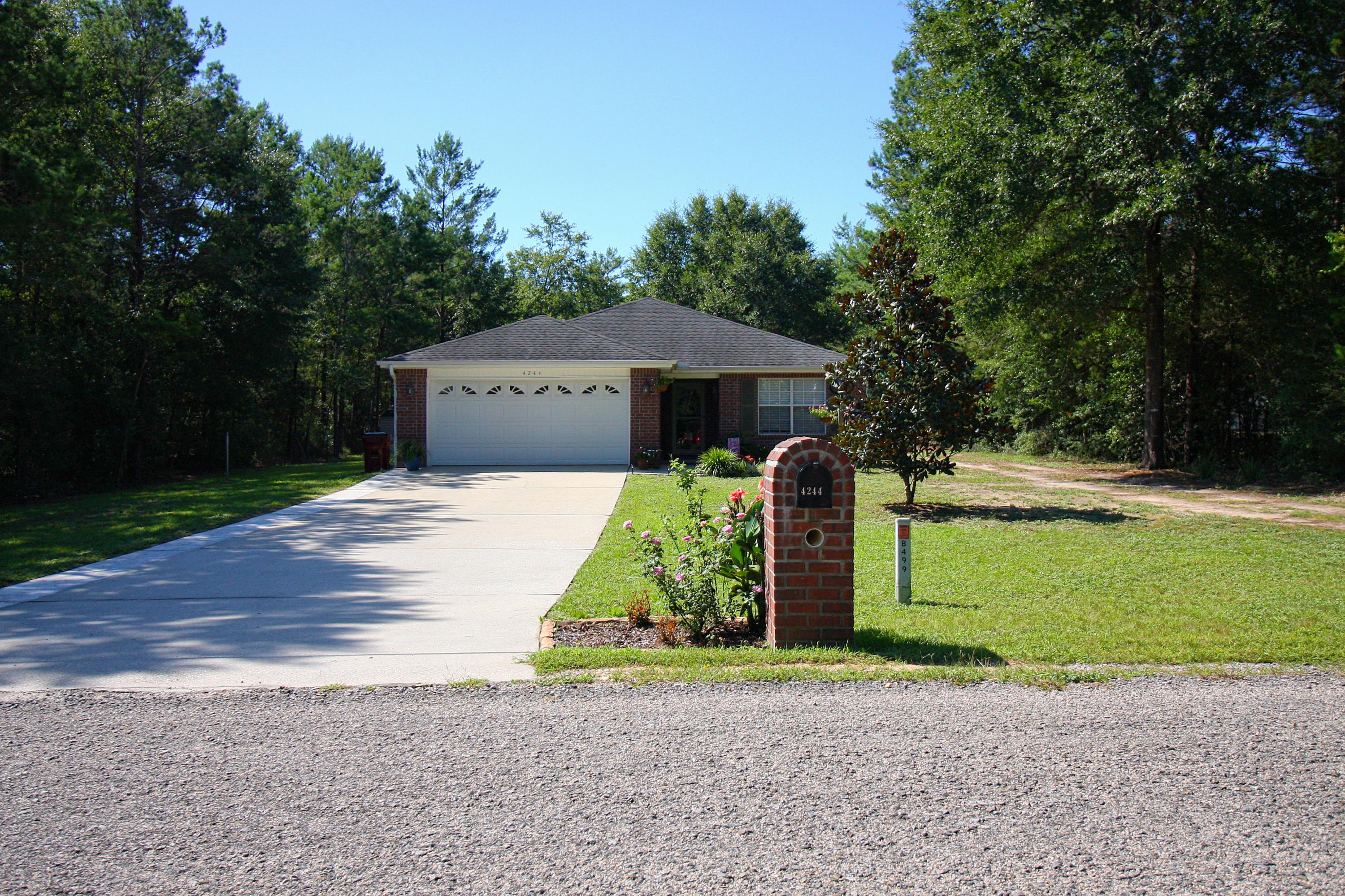This impeccably maintained slice of heaven is now FOR SALE! This 2008 home features 3 bedrooms, 2 baths and is situated on a generous 1.16 acre lot in Country Estates! This split bedroom floor plan boasts new high end laminate and tile throughout, with generous closet space, fresh paint and updated faucets and fixtures. The master bath is complete with a whirlpool tub, walk in closet with built in bedroom TV mount. It only gets better as you exit through the back door to the screened in porch, perfect for outdoor dining! The owners have fenced a smaller portion of the lot with RV access along right side of home, and raised garden beds, workshop and 20x24 RV awning, complete with water and electric hook-ups! **Currently under contract and accepting back up offers**