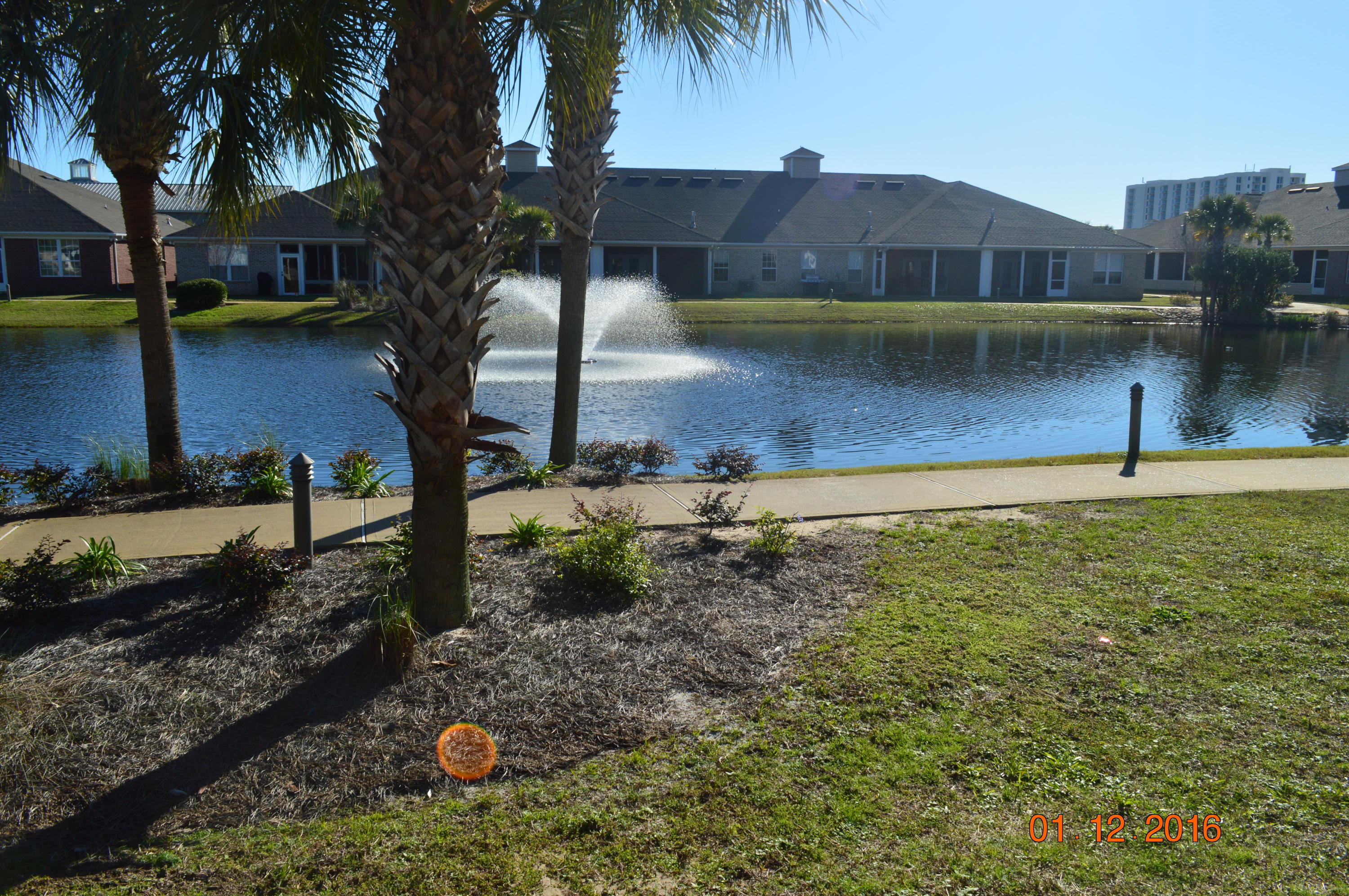 Ready to move in. This one story, brick townhouse with double car garage is centrally located in the heart of Destin. Close to shopping and just a couple minutes from beach. 10ft ceilings inside living room with 9ft ceiling in bedrooms. Has had a long term tenant in there for 4 years (no short term rentals allowed). Easy wheelchair entrance. Brand new carpet, coming soon. Upgraded tile living area w/carpeted bedrooms and split, one level floor plan. Ceiling fans throughout, Jacuzzi tub, and loads of storage. Diamond Lakes is centrally located, with community pool & walking paths. Exterior maintained by HOA. Well maintained and safe community.