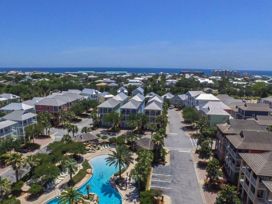 THIS HOME'S PREMIER LOCATION DRIVES HIGHER RENTALS! GREAT INVESTMENT OPPORTUNITY. Earn an estimated $38,329 NET income after expenses or 29% Return on cash w/financed purchase or an estimated $71,605 NET income or 11% ROI w/cash purchase! Offering the BEST location in the Villages, this fabulous 3-story furnished home W/5 bedrooms, 4 baths & 2 LARGE LIVING ROOMS, overlooks the 35,000 sq ft zero entry comm pool w/ waterfalls, tiki bar & grill station & is just 3 blocks to the beach. Designed to provide an incredible vacation experience for large groups/families, this Home is close to dining, shopping, entertainment & offers seasonal trolley to beach. Other features include updated Kitchen & baths all w/granite, high ceilings, 2 master suites, 1st & 3rd fl living rooms, 2  bar areas and 3 covered porches providing great views. To maximize rental income, this home is set up to generate high rentals for a savvy investor, or offers the opportunity to offset some or all of the costs of owning a fabulous beach getaway!  