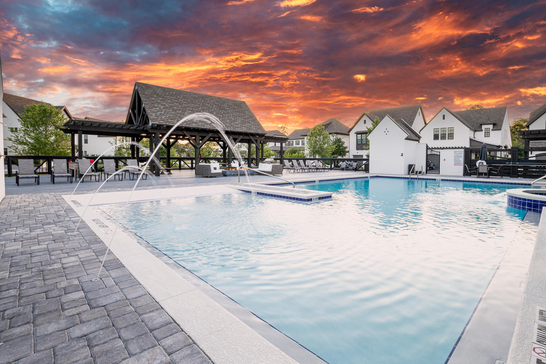 Ridgewalk is an exclusive non short term rental community near the west end of 30A. Minutes to great beaches of 30A, shopping, hospital and restaurants. Once inside the gates you will find that true sense of community you have been looking for.The beautiful Biarritz floor plan is perfect for your family gatherings. This home comes fully furnished and is turn key. With four bedrooms and three and one half bathrooms. This home has two master bedrooms with ensuite baths and walk in closets. One master bedroom down stairs and one upstairs. This home backs up to three acres of conservation which means you don't have neighbors behind you..