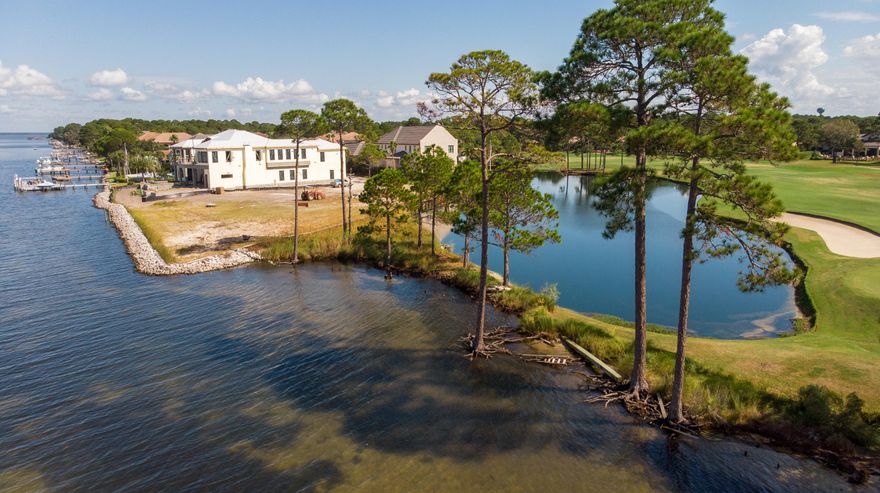 A Sunset Lover's Paradise. This is truly a unique lot within the gates of Burnt Pine. This lot not only offers 180 feet of bay frontage; it also offers the opportunity to build an estate size home with incredible views of the Choctawhatchee Bay, lake, and golf course views of the beautiful 13th hole on the private Burnt Pine golf course. It's literally the last Bayfront lot of its kind within the gates of Sandestin Golf and Beach Resort. Burnt Pine is an exclusive and gated community within Sandestin Golf & Beach Resort offering the ultimate, premier lifestyle of primary residences or 2nd homes. Owners are eligible to become members of the Burnt Pine Golf Club and are able to take advantage of the many benefits and clubs Sandestin has to offer.