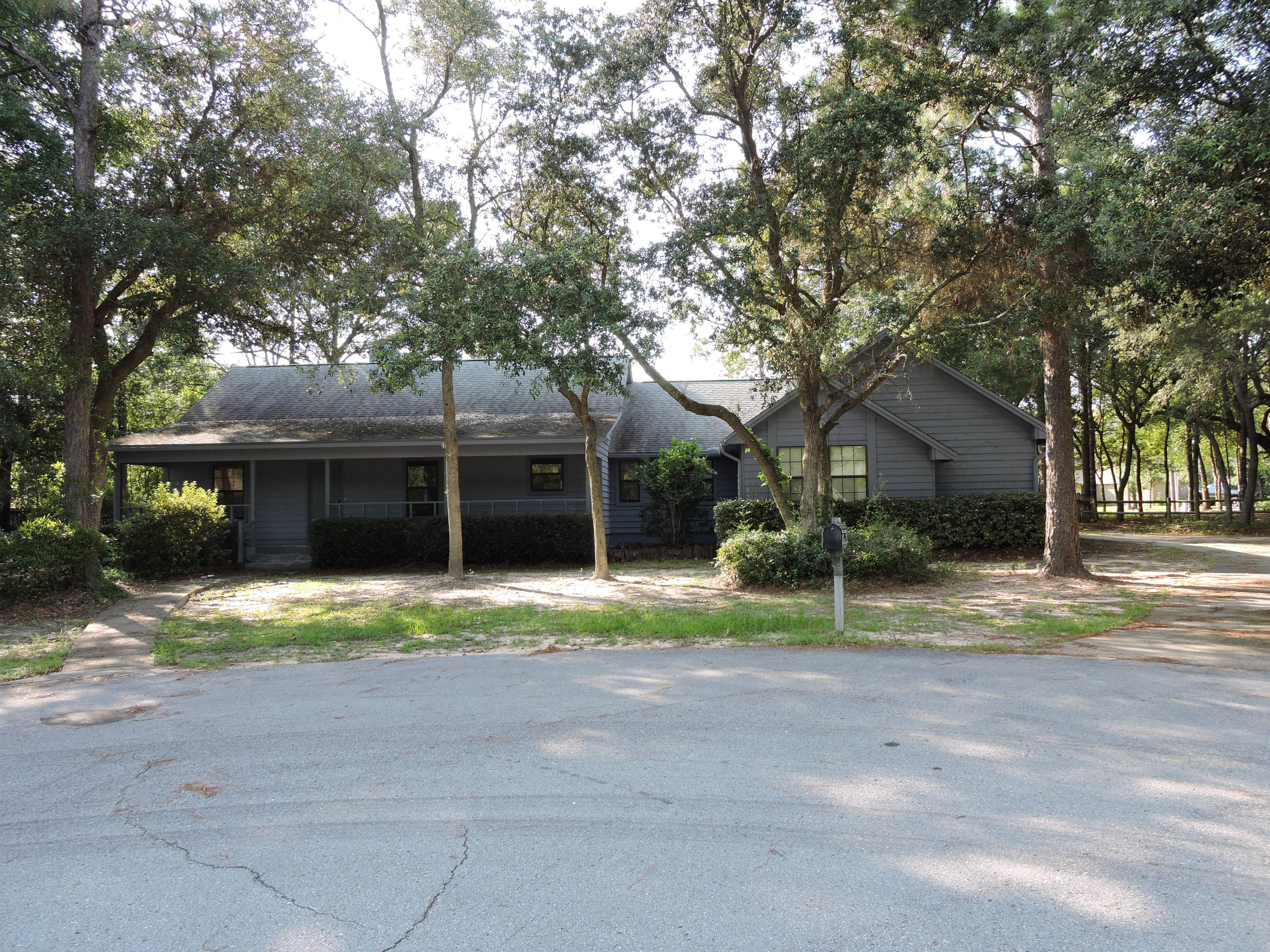 South of I-10 off of Live Oak Church Rd features a one owner home with freshly painted exterior. The home features 3 bedrooms with split floorplan design, 2 full baths, 2 Car side load garage, a separate one car garage/workshop with separate opener, Cathedral ceilings in Family room (with Toungue and groove wood ceiling) and master bedroom. Off of the Master and Family room boasts a large 9.5x22.5 fully enclosed sunroom that is great for entertaining. The kitchen is open to the dining room and features tiled flooring as well as canned lighting. The spacioius laundry rooom in between the garage and kitchen features a large pantry as well. There is a large covered porch in the front of the home where you can relax. Schedule your showing today!