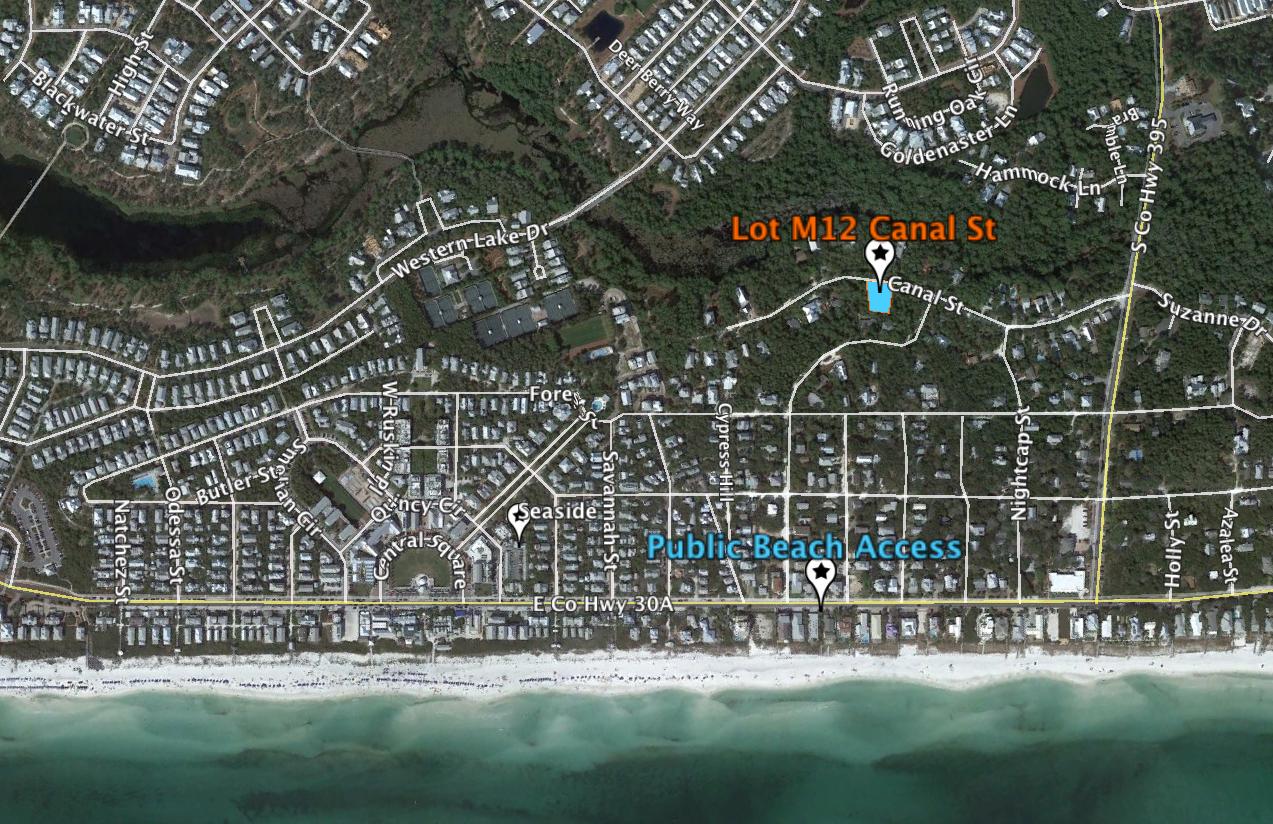 One of the larger lots available in Old Seagrove, Lot 12M is larger than a 1/4 acre, canopied with Oaks and tall Sand Pines, and Magnolias, with a natural opening for building in the center of the lot. Canal Street is one of the very few remaining ''non-through streets'' in Seagrove, giving added privacy. Only 2 blocks to Seaside and only 3.5 blocks to the public beach access located between Dogwood St and Thyme Street. Enjoy strolls to see the sun setting over the Gulf of Mexico, or walk to Seaside for breakfast, lunch or dinner, shopping and entertainment. This area of Old Seagrove is a favorite of locals and visitors alike. Ask Listing Agent about additional land availability.