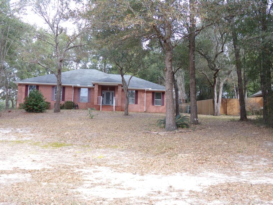 Water view all brick, 3 bedroom, 2 bath home on large corner lot~ Large great room with electric fireplace & cathedral ceiling with French doors leading out onto the large screened in back porch~ Kitchen and breakfast room are tiled as well as the formal dining room~ Split floor plan with the master bedroom has trey ceiling, with door opening onto large screened porch~ The back yard is fenced with double entry gate on side~ Formal dining room is tiled and has double trey ceiling~ Large screened porch to enjoy the back yard~ Trees trimmed up, with full house gutters pressure washed as well as driveway and walk way~