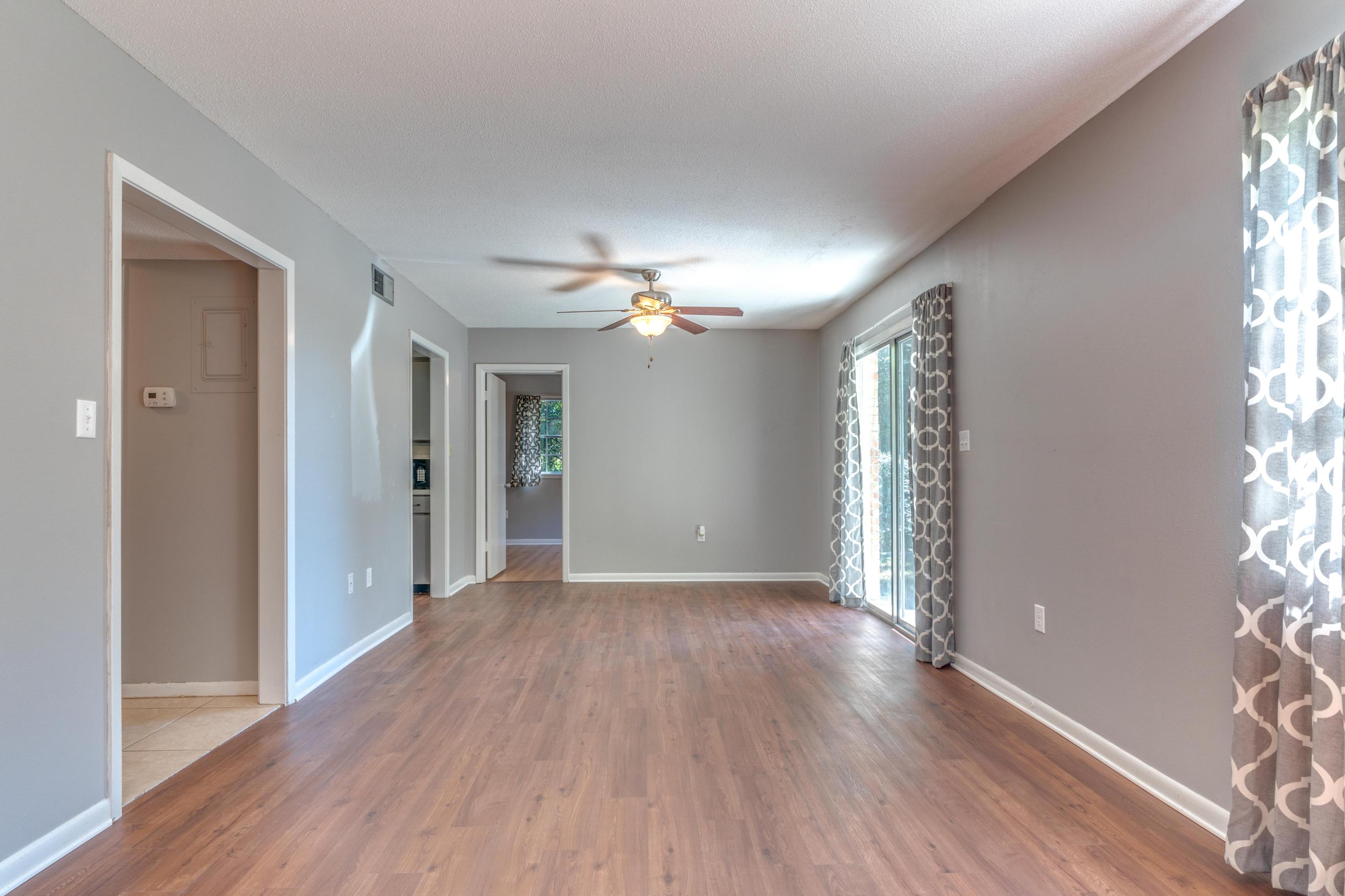 Own this 3 bed 2 bath condo for just $110,000! Updates include fresh paint and flooring throughout. Private Washer and dryer hookup in unit! This condo is an end unit with easy access through two doors on the first floor. Comes with private storage closet off community laundry area, pool access, and parking.