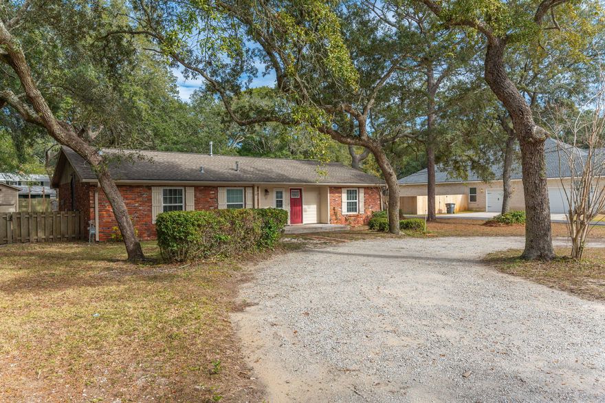 Welcome to this charming 3-bedroom, 2-bathroom home located in Valparaiso with easy access to Eglin AFB! This cozy house features a large yard perfect for outdoor activities and entertaining guests. The property also includes an outdoor storage shed for all your storage needs. With a short distance to the water at Boggy Bayou, you don't want to miss out on this opportunity to make this house your new home! Contact us today to schedule a tour!