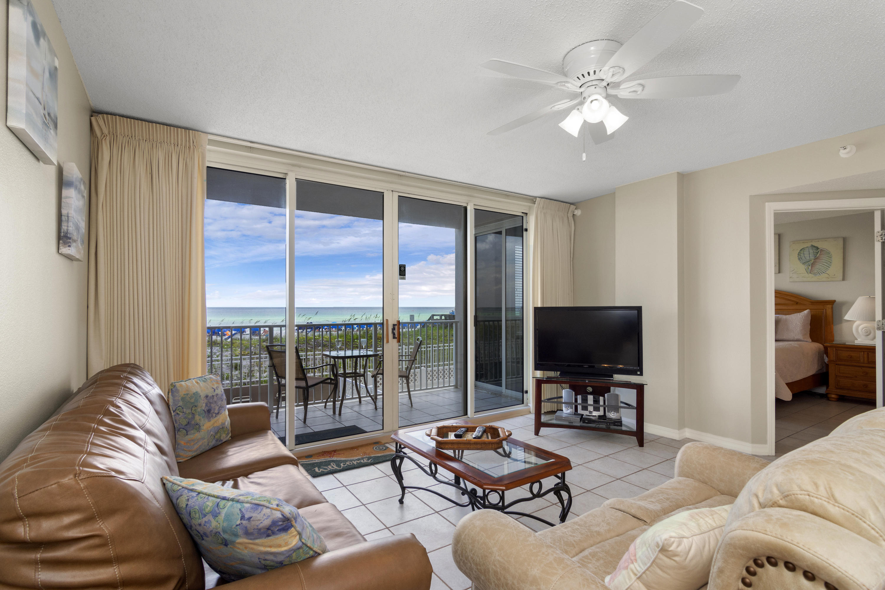 REDUCED PRICE! Have your own piece of beach paradise with this beautiful 2nd floor unit with panoramic Gulf view. Park on the second deck and never have to wait on the elevator. Covered parking on the ground level and you are just seconds to your unit. Tile flooring throughout for easy maintenance and plenty of storage. This beautiful condo comes freshly painted, fully furnished and is turn key ready to rent or use as a second home. Amenities include swimming pool, exercise room and BBQ grills. Rental Projection in documents. Come and see why everyone is talking about Okaloosa Island and all the new development taking place. So Many wonderful attractions for the whole family.