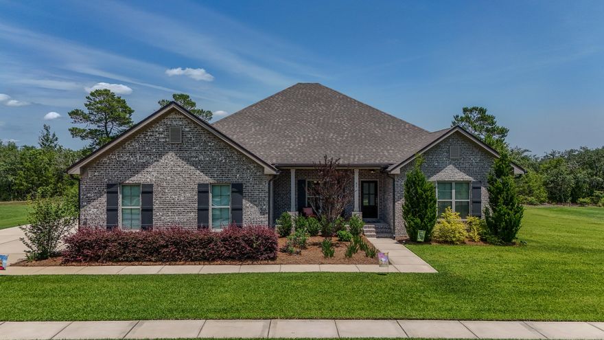 Welcome to 92 Hollow Log Lane - Elegance & Comfort in Windswept Estates.Discover refined living in the gated golf course community of Windswept Estates with this beautifully like-new 2,808 sqft appointed 4-bedroom, 3-bath home on .64 acres, featuring an additional flex room, perfect for a private office, playroom, or bonus space to suit your lifestyle.Located on a quiet, well-maintained street, this home welcomes you with tall ceilings and an open-concept layout filled with natural light. Engineered hardwood floors flow seamlessly throughout the home, adding warmth and sophistication to every room. The spacious living area connects effortlessly to a stylish gourmet kitchen and dining space, ideal for entertaining or gatherings. The primary bedroom is complete with a luxurious en-suite bathroom with an oversized walk in shower and ample closet space. Three additional bedrooms provide comfort and versatility for you or your guests.

Step outside to a peaceful backyard oasis with plenty of room to add your own personal pool or take advantage of the incredible community amenities, including a championship golf course, clubhouse, resort-style pool, tennis and pickleball courts, and a playground.

Special Offer: The Seller is offering $8,000 toward Buyer's closing costs, prepaids, or interest rate buy-down at closing with an acceptable offer; a valuable incentive to help make your move even more affordable.

Enjoy upscale living just a short drive from the beaches of South Walton, shopping, dining, and top-rated schools. Schedule your private tour of 92 Hollow Log Lane today and see why Windswept Estates is one of Freeport's premier communities.