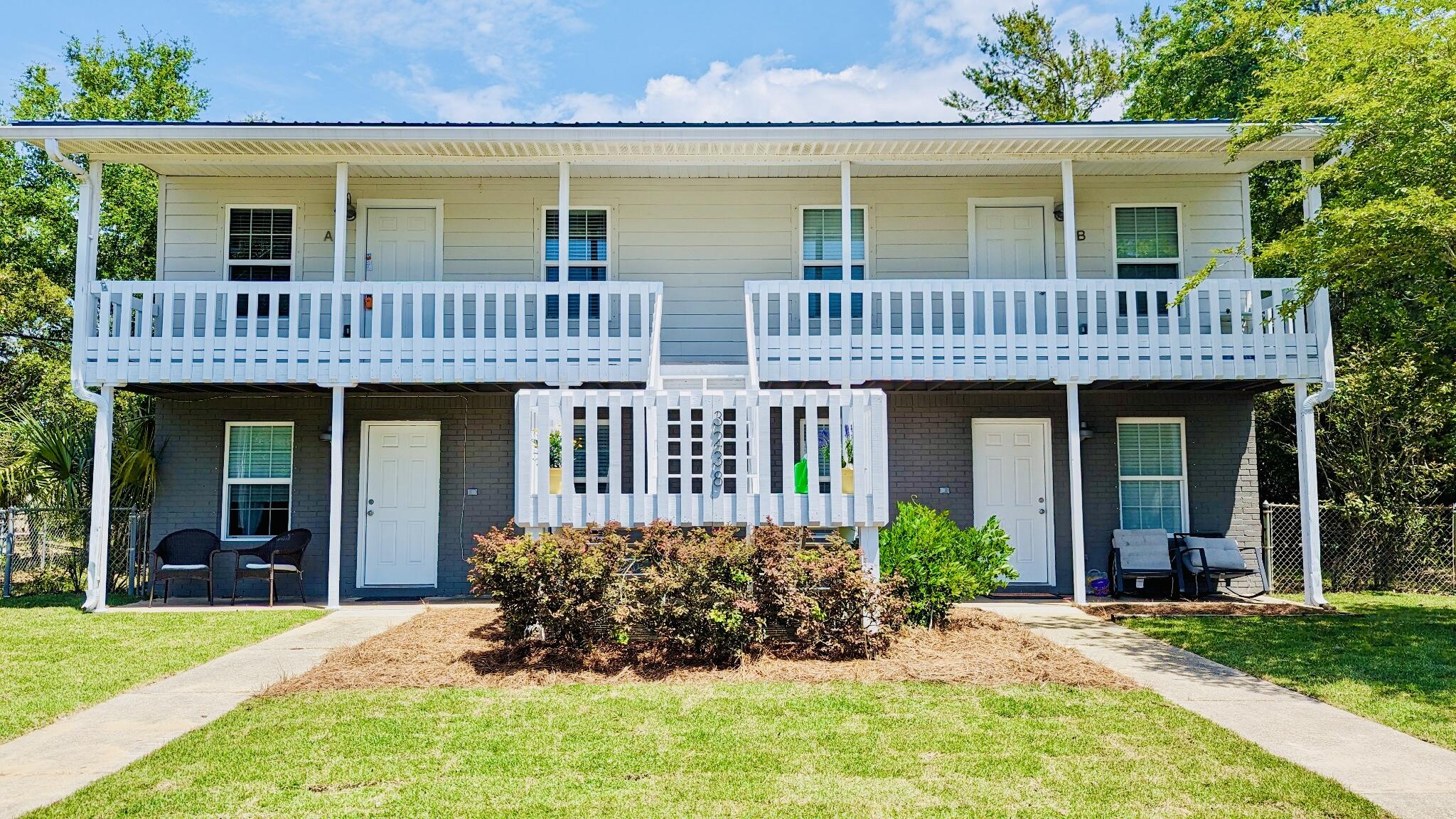 Located in the highly desirable Santa Rosa Shores neighborhood of Gulf Breeze, this beautifully remodeled quadplex offers a fantastic opportunity for investors or homeowners seeking a turnkey property. Each of the four units features 900 square feet of living space with 2 bedrooms and 1 bathroom, perfect for comfortable living.The interiors have been meticulously updated, with all-new flooring, quartz countertops, LED lighting, and stylish bathroom fixtures. The kitchens come fully equipped with stainless steel appliances, including a stove, dishwasher, and refrigerator. An indoor laundry area with convenient washer/dryer hookups is located just off the kitchen.This quadplex underwent a complete remodel in 2018, including new AC units, water heaters, appliances, and flooring he building's interior is in pristine condition, offering a modern, move-in-ready feel. Metal roof installed to last a lifetime.

Outside, the property has been well-maintained, with fresh sodding installed just this past summer, adding to its curb appeal. The location is unbeatable, situated near the Tiger Point Golf Course, shopping, schools, and recreational facilities. The Gulf Breeze community also offers convenient access to Pensacola Beach, local parks, and the Oriole Beach Elementary, Gulf Breeze Middle, and Gulf Breeze High School school zones. The local fire station and law enforcement substation are just a block away, enhancing security and peace of mind.

Don't miss out on this exceptional investment opportunity or the chance to own a beautifully updated property in a prime Gulf Breeze location!

