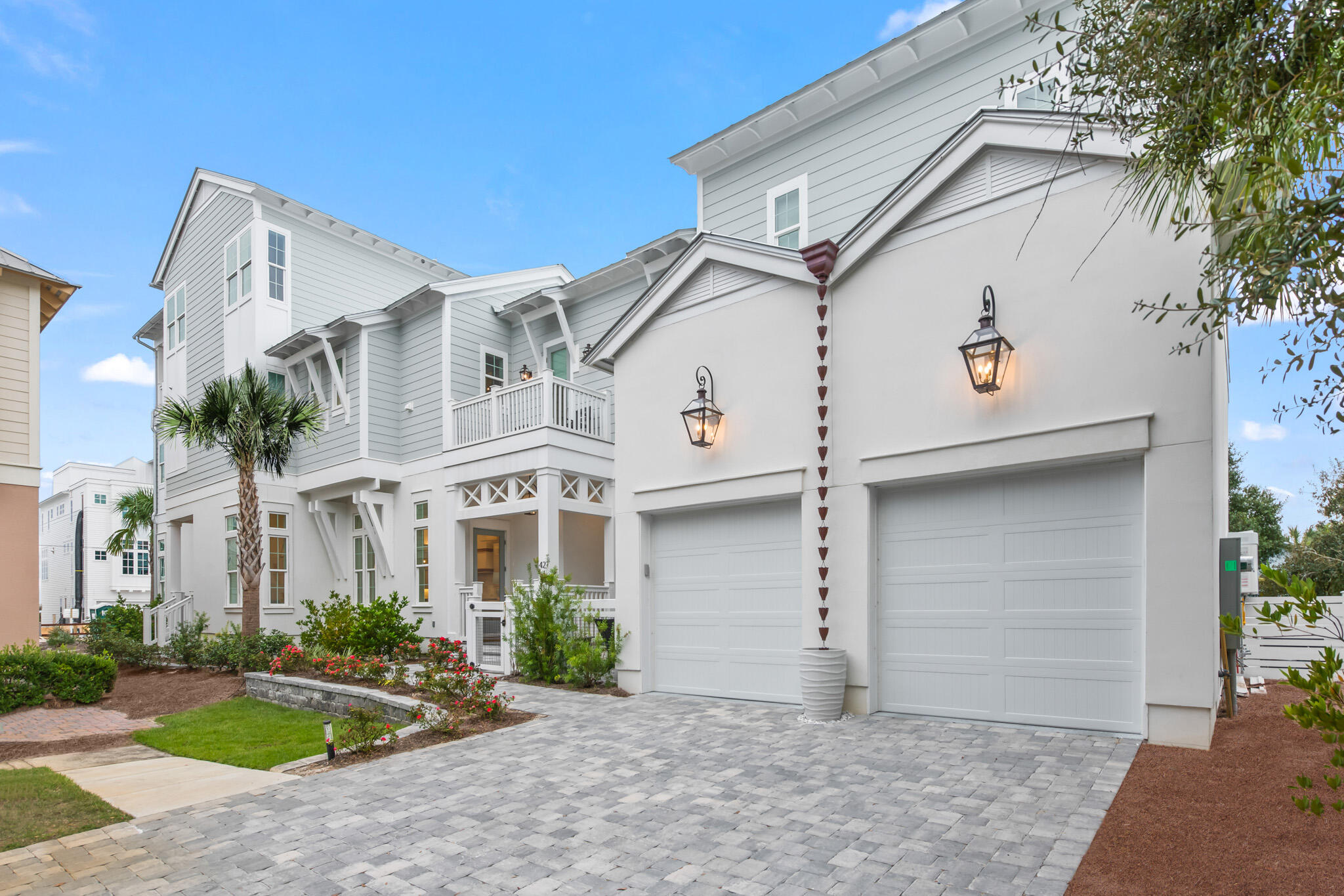 A coastal oasis, this spacious residence boasts a prime Inlet Beach location along 30A's coveted east end. The close proximity to both the beach and to bustling town centers is superb, with just a short stroll to the beach as well as the neighboring shopping and dining of both Rosemary Beach and 30Avenue. A testament to the coastal lifestyle, the spacious plan was designed with memorable beach gatherings in mind. With wood flooring throughout, a private heated pool, and a two-car garage, this five bedroom beach home appeals to a discriminating buyer. Upon entering the home, you will be greeted by a bright and open living area, centered around a gas fireplace that showcases a stunning shell stone finish.