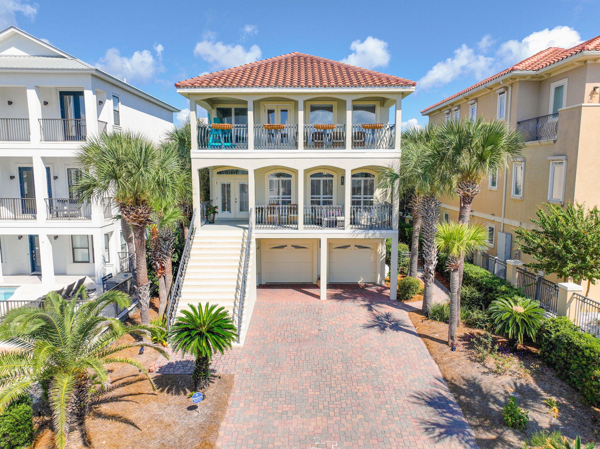Welcome to 17 Sandy Dunes Circle, a beautifully designed three-story coastal retreat located just half a mile from the sugar-white sands of Miramar Beach. This spacious 4-bedroom, 3.5-bathroom home offers the perfect blend of comfort, style, and proximity to the beach -- ideal for full-time living, a vacation getaway, or a lucrative rental investment.Step inside to discover a light-filled interior with thoughtful finishes and an open-concept layout perfect for entertaining. The main living area is bright and inviting, while the well-appointed kitchen features ample cabinetry and modern appliances.Enjoy the sea breeze from any of the three private balconies, offering serene spaces for morning coffee or sunset cocktails.