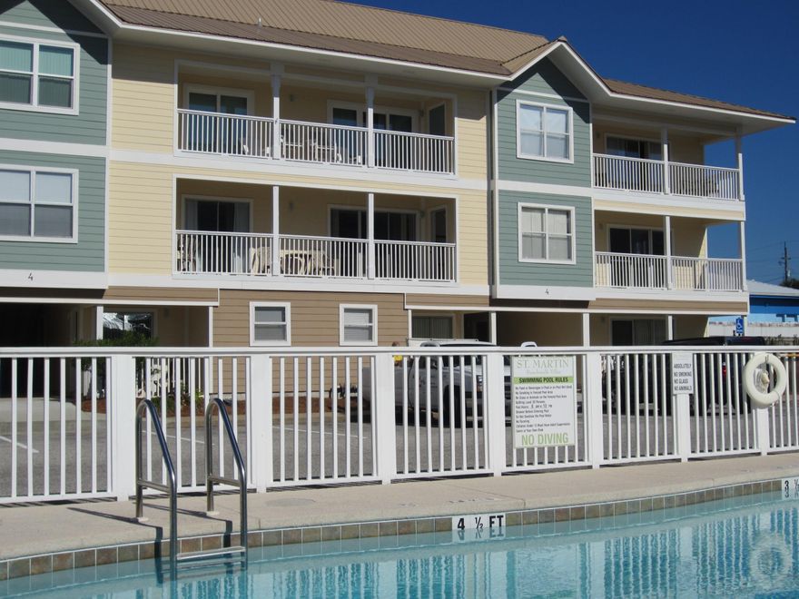 BEST 3 BR VALUE SOUTH OF US 98. From the announcement of this project in 1992, this location has been known as the best 3 bedroom value south of US 98. No major highway to cross to reach the beach, easy walking distance to several restaurants, and directly across the street from the famous ''Big Kahuna's Water Theme Park''. Enjoy a shaded balcony during the late spring to early fall and a sunny balcony during the winter months. The property has recently added a new metal roof, new exterior paint, and the overall property is well maintained. View the many attached photos for descriptions of the property. This second floor condo has a direct view of the pool and clubhouse, Family members can enjoy viewing younger family members at the pool, while relaxing on the shaded balcony. New $4300 Central heating and air conditioning unit installed May 2015 and a new hot water heater in 2014.