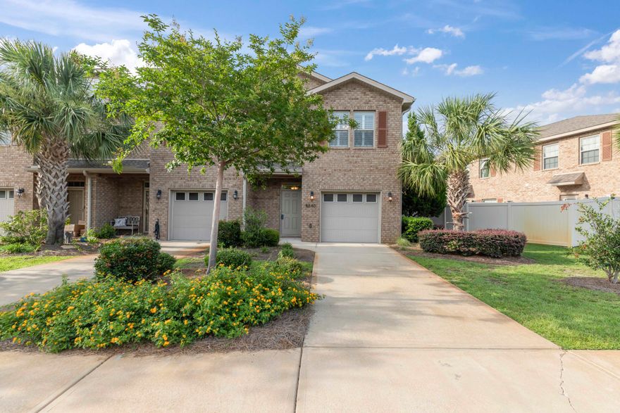 Updated End Unit close to the pool and play area.  This unit has a huge green belt in the back to play and run.  Updates include Flesh Paint inside, New Carpet upstairs and in the bedrooms, New Plantation Shutters.  This building had a new roof put on in May of 2019.  The unit also has gutters.  Comes with all appliances including a washer and dryer.  Hurricane panels come with this unit.  The garage has shelving for storage.  Complex is so close to Hurlburt and the hospital.  This complex play area and pool is great for both the kids and the adults to play.  Complex is also dog friendly-pet areas for the pooch.  Ready for New Owners to enjoy.