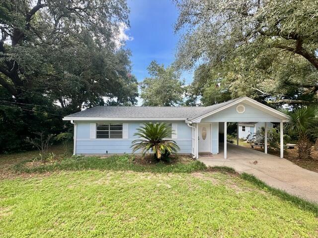 Available October 3rd!! No PetsThis charming Florida cottage is situated on a generously sized, fully fenced corner lot surrounded by mature landscaping. The home features tile flooring throughout the main living areas and carpeting in the three bedrooms. The kitchen is equipped with a gas cooktop, wall oven, refrigerator, and a stainless steel dishwasher. The front-loading washer and dryer are located in the storage room/laundry area, accessible from the carport. Additionally, the backyard boasts a shed/workshop with electricity and a workbench.Tenant to verify all data. Please contact Sound Choice Real Estate to schedule a showing- 850-389-8533.