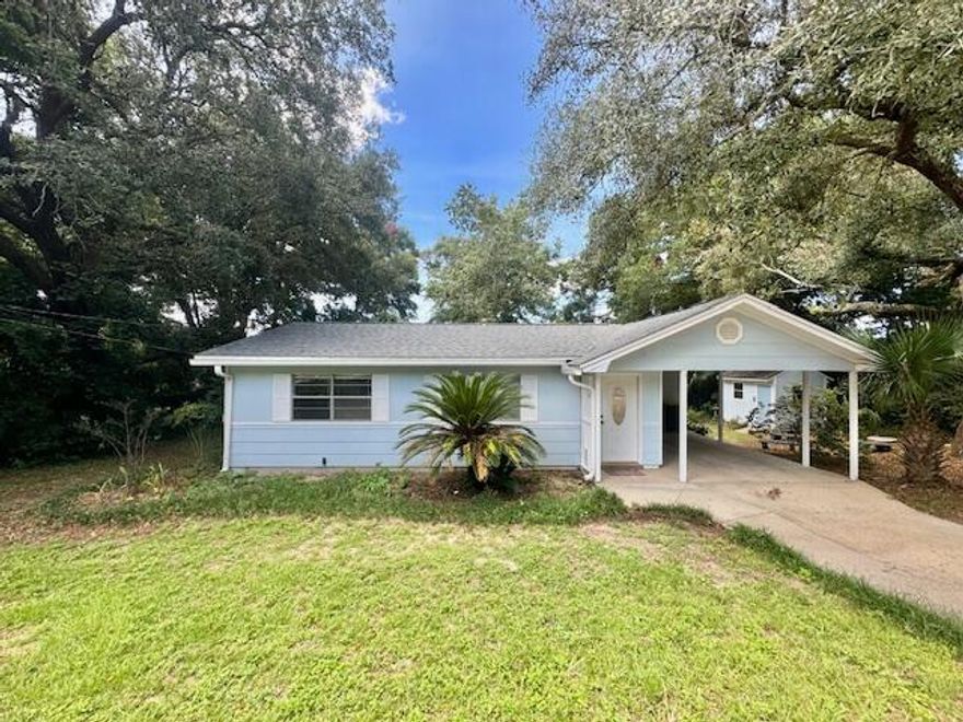 Available October 3rd!! No PetsThis charming Florida cottage is situated on a generously sized, fully fenced corner lot surrounded by mature landscaping. The home features tile flooring throughout the main living areas and carpeting in the three bedrooms. The kitchen is equipped with a gas cooktop, wall oven, refrigerator, and a stainless steel dishwasher. The front-loading washer and dryer are located in the storage room/laundry area, accessible from the carport. Additionally, the backyard boasts a shed/workshop with electricity and a workbench.Tenant to verify all data. Please contact Sound Choice Real Estate to schedule a showing- 850-389-8533.