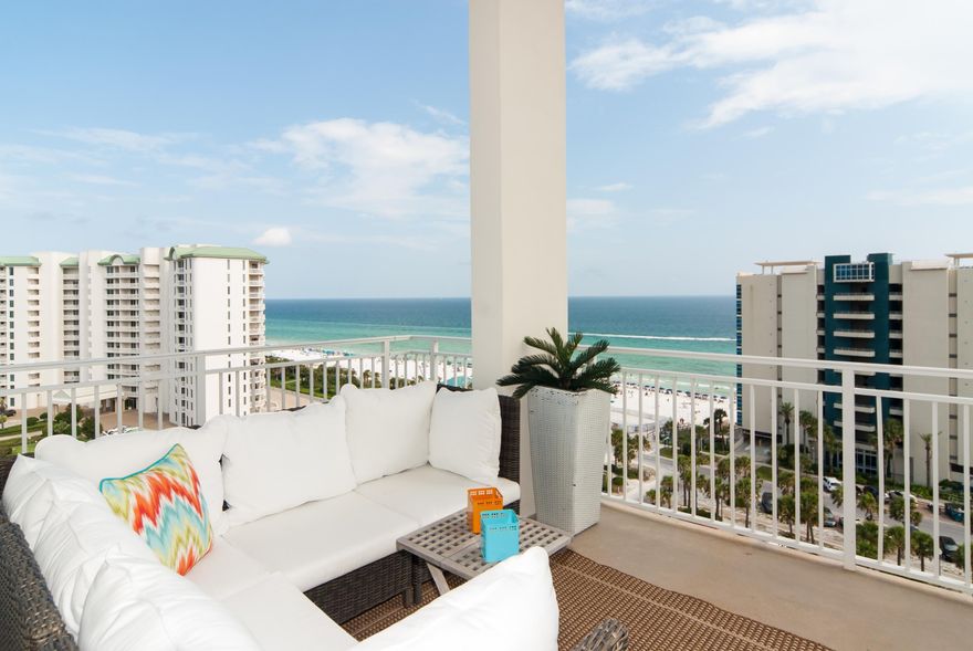 Completely redecorated with upscale designer furnishings... SPECTACULAR views from this east end Penthouse home are enhanced by 11' ceilings with transom windows over wall-to-wall glass doors. PH1 was designed with 2 large master suites; a lock-out suite with a private entrance & balcony, wet bar with refrigerator, luxurious bath with jacuzzi, separate shower and walk-in closet. The other master suite, with BREATH-TAKING views of the Gulf, also has a luxurious bath with jacuzzi, separate shower & walk-in closet. The 469 SF, balcony is wonderful for entertaining and makes this spacious floor plan ideal for a permanent residence and/or rental investment. Sterling Shores offers a private beach club with heated pool and grill, a 4500 SF tropical pool, surround-sound theater, and fitness center