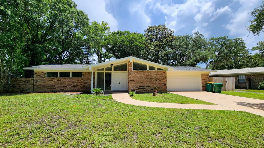 Step into this beautifully renovated 3-bedroom, 2- bathroom brick home!! Every inch of the interior has been thoughtfully updated, offering modern comforts with timeless charm. Inside, you'll find a stunning new white kitchen featuring sleek cabinetry, quartz countertops, and updatedappliances! Both bathrooms have been completely refreshed with contemporary finishes, and new flooring flows throughout the home, tying each space together with style and warmth. Bright new light fixtures add a modern touch, while large windows allow natural light to pour in. Relax year-round in the Florida room, ideal for enjoying morning coffee or unwinding in the evening. Additionally, the home has been completely rewired to code in 2025 & Roof was install in 2017. This move-in ready home combines quality updates with a fantastic location within close proximity to schools, shopping, and the beach. Don't miss your opportunity to own a fully remodeled home in a wonderful community! 