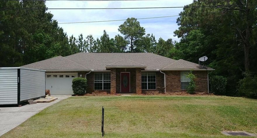 Built in 2006, this wonderful 4 Bedroom Home is close to Beaches, Bases, Schools and Shopping! NO HOMEOWNERS ASSOCIATION! Current owners have chickens! There is a Large Great Room with Corner/Tiled Fireplace, Vaulted Ceiling & Rounded Sheetrock Corners. The Kitchen has Abundant Wood Cabinets, Quality Counter Top, Pantry and a Large Breakfast Bar that opens to Breakfast Nook and Living Room! There is also a Formal Dining Room! The Master Suite has a Trey Ceiling, Large Walk-in Closet, Double Raised Vanity, Separate Shower & Garden Tub! The Back Yard is like a Private Park! There is a Large Open Patio w/Access from the Great Room and the Master Bedroom! Other features include: Brick mailbox, 30 Year Dimensional Shingles, Glass Oval Front Door & Decorative Brickwork! Carpets are being deep cleaned the week of May 1st. Call to See this Beautiful Home Today!!!!