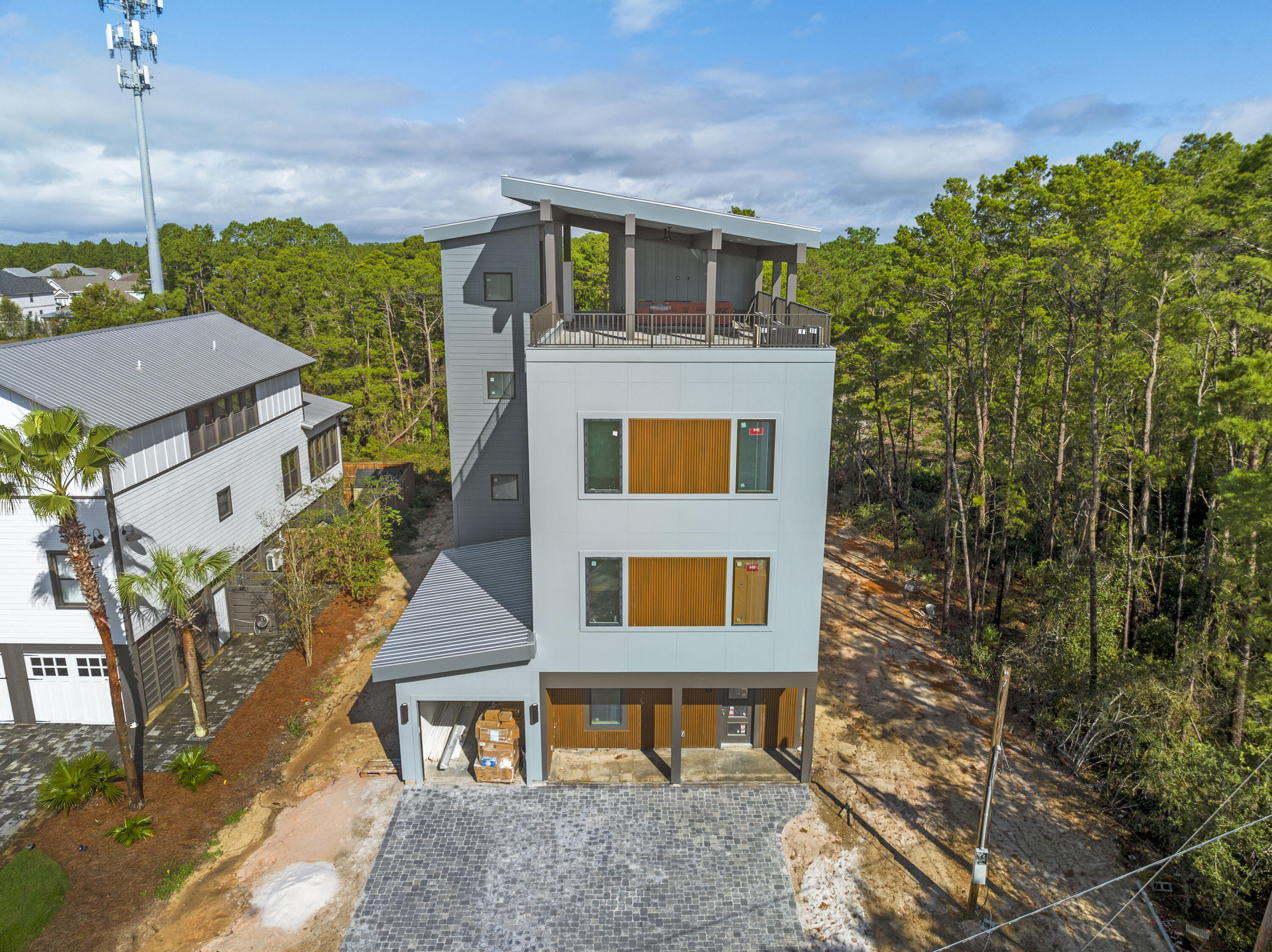 Welcome home to this spectacular 6-Bedroom New Construction Beach house with rooftop Terrace overlooking protected state park and your private outdoor pool! As you step inside, you'll be greeted by a light-filled open-concept living area that seamlessly blends modern luxury with beachside charm. The spacious living room features oversized windows, 10' ceilings, designer light fixtures, and SOHO LVP. The kitchen boasts Quartz countertops, luxury appliances, and Designer chimney hood. Each bedroom is thoughtfully placed throughout the home and have their own en-suite bathroom. The 3rd Floor gameroom/ bonus space is equipped with a wetbar and allows quick access to the approx. 1400sqft of rooftop outdoor entertaining space ! Elevator access to all floors of the home including rooftop terrace The rooftop deck is reinforced for a hot tub, and a luxury outdoor kitchen is available. The SkyBlu plan offers 3 levels of refined luxurious living with upscale interior finishes and features including Quartz countertops, GE Profile appliances, elegant flooring and lighting options, a garage and ample front parking. Make this paradise yours and start enjoying the good life.
Located in the heart of Blue Mountain Beach, this spectacular beach house comes with an enviable lifestyle. Gulfview Heights beach access is 0.7 miles away and has abundant parking and restrooms. Gulf Place Town Center offers boutique shopping, restaurants and live entertainment nearby while popular eateries including Basmatis and Local Catch are within strolling distance. With no HOA and no maintenance for the foreseeable future, this superbly located beach house is the ultimate primary or second home in a neighborhood that's ideal for vacation rentals.
Prices, plans, features, and options are subject to change without notice. Additional restrictions may apply. Square footages are approximate. Home information including features and available options are subject to change. Artist renderings, photos, colors, features and sizes are for illustration purposes only and will vary from the homes as they are built. Elevations, exterior/interior colors, available upgrades, options, and standard features may vary and may include select options, elevations, and upgrades that require an additional charge. School zoning is outside of BluScape Homes' control and is subject to change at any time.