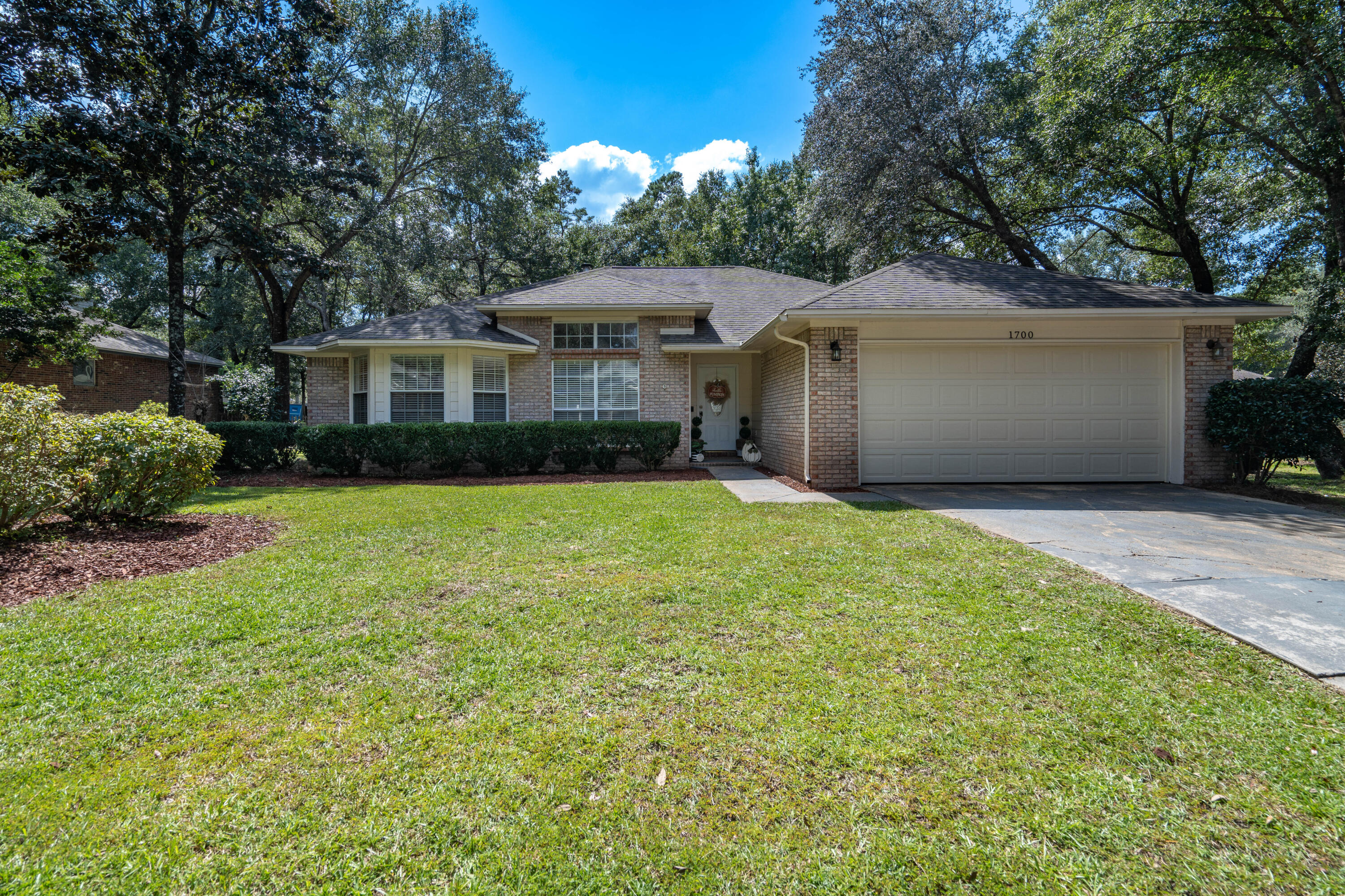 Welcome to Crestone Cove, located in the highly desirable community in Parkwood Estates. This appealing Bluewater Bay home offers 3 spacious bedrooms, 2 bathrooms, a sizable backyard and a 2 car garage. The property is conveniently just minutes away from schools, shopping and a short commute to military bases Eglin, Hurlburt and Duke. The contemporary style residence has been completely renovated throughout and is the definition of lavish living. Updates and custom designs modernize the home with new flooring, neutral painted walls, reformed bathrooms, along with an open kitchen that's perfect for all types of entertainment. This home is a MUST SEE, and it won't last long. Schedule your private showing today!