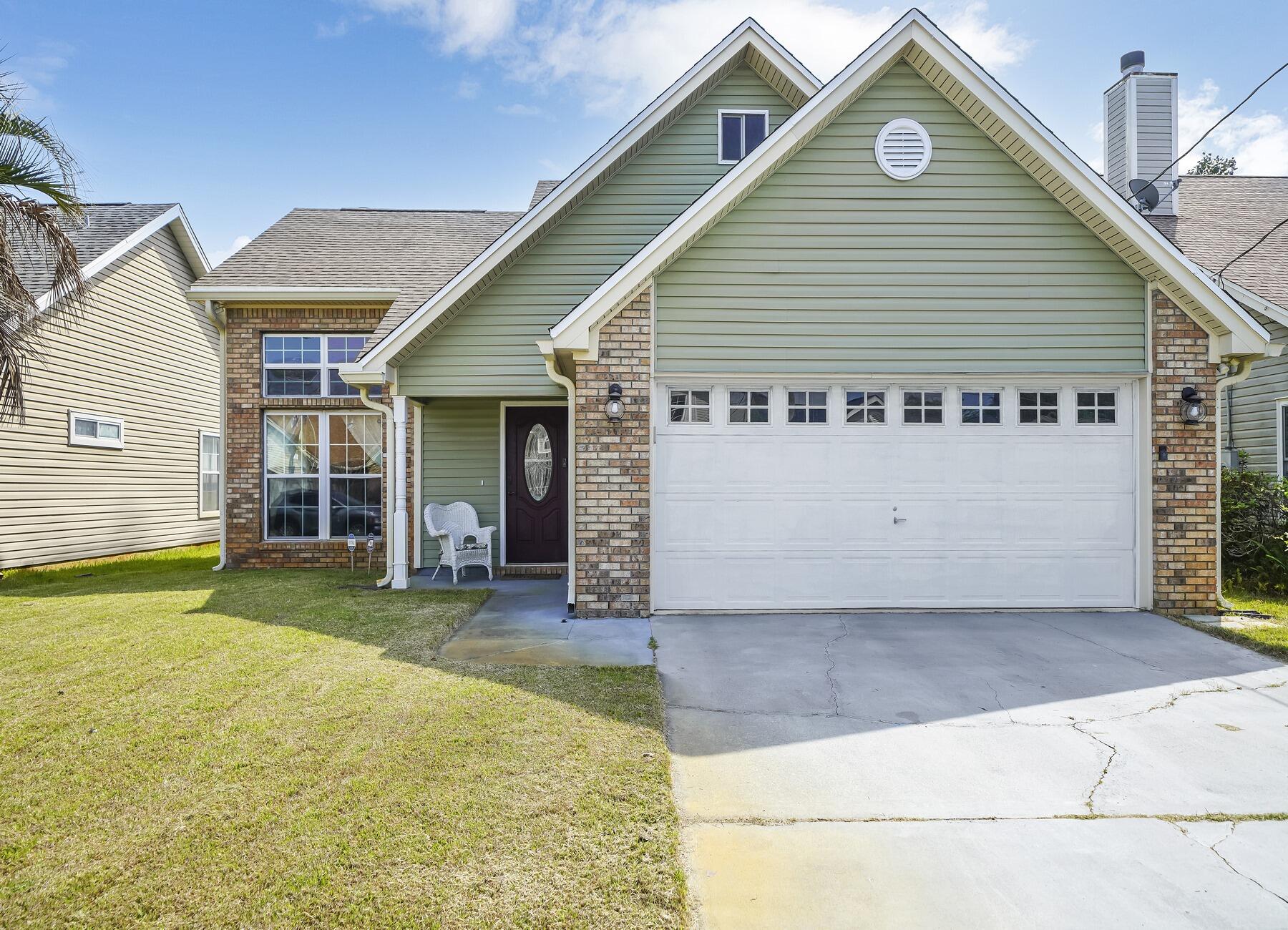 Come see this amazing home located within 10 minutes of Hurlburt Field. This house requires zero updates boasting 4 bedrooms and 2.5 bathrooms with newer HVAC system. Upon walking in, you'll notice the impressive stone fireplace feature wall, granite counters and soft close drawers, modern wrought-iron spindle staircase, water efficient toilets, built-in adjustable shelving in closets, coated garage flooring and more. No detail was spared, Wood and tile flooring throughout with updated crown molding.