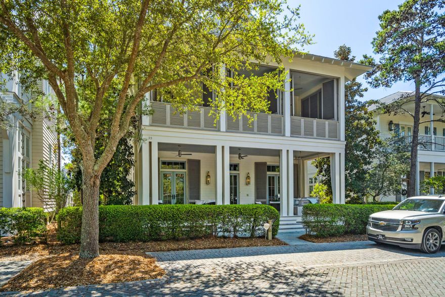 Welcome to the newly remodeled and decorated 33 Sand Hill Circle in WaterColor.  In one of the most desirable locations within WaterColor you will find this extraordinary 4731 SF luxury coastal living residence that includes a main house and large guest apartment - 5 bedrooms plus bunkroom, 5 baths and 2 powder rooms.  Conveniently located across from the Frog pool, this property impresses with fine finishes at every turn. A generous sized front porch spans the width of the home with gas lanterns, two seating areas, oversized custom swing with 3 sets of double doors that open into the expansive main living room with multiple seating areas, kitchen and dining room with exposed antique ceiling beams, 100-year-old reclaimed white oak floors, Pecky Cypress interior doors, shiplap walls,