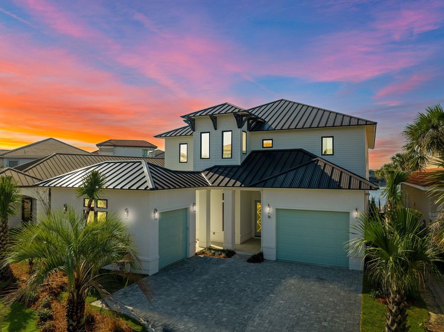 $200,000.00 Price Improvement! FULLY FURNISHED! Seller also placing the home on a rental program - request a showing now! This custom-built home offers a spacious 5-bedroom, 2-bunkroom layout with 6 full bathrooms and 2 half baths. Featuring two luxurious primary suites, one conveniently located on the first floor with a spa-inspired bathroom and a walk-in closet. Both primary suites boast access to expansive outdoor porches, perfect for relaxing and enjoying the beautiful surroundings.Inside, you'll find exquisite white oak hardwood floors, granite countertops, and soft-close cabinetry throughout the home, providing a timeless appeal. The inviting living area includes a cozy gas fireplace and a wet bar, creating an ideal space for both relaxation and entertaining The chef-inspired kitchen is fully equipped with top-of-the-line Electrolux side-by-side refrigerator and freezer, dual dishwashers, a custom hood, and a Fornal 8-burner range/oven. For added convenience, the first-floor laundry room features two washers and dryers for maximum efficiency.

Entertain in style with the beautifully designed summer kitchen, complete with Nature Kast cabinetry, a gas grill, beverage cooler, and sink. The home's exterior is pre-wired for landscape lighting and features a space for a charming firepit in the front courtyard, perfect for evening gatherings.

Don't miss the opportunity to make this incredible property your own and experience luxury living in the highly sought-after Destiny East community! Projections for the home upwards of $200,000 a year. Please see the documents for relevant information. 