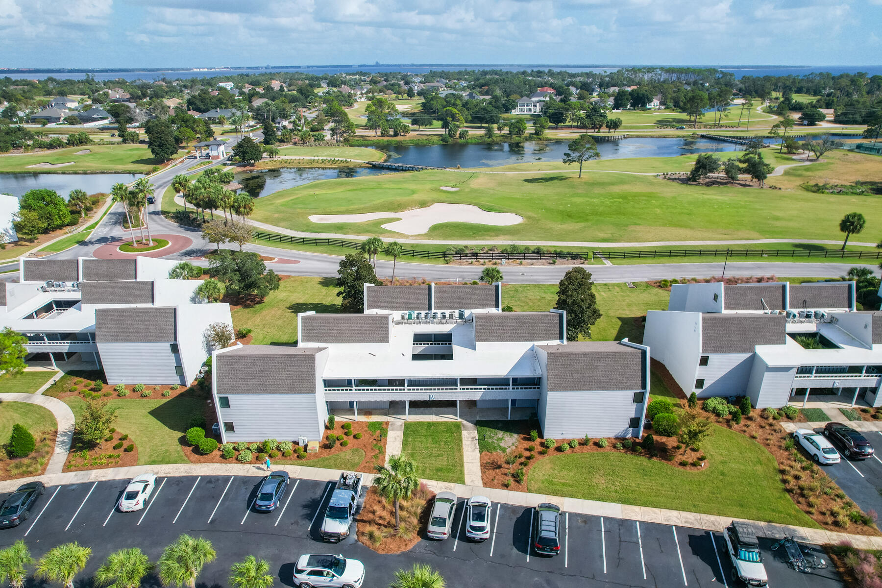 Owner Financing available with 30% Down; 6% interest Rate, amortized over 30 years with a 3 or 5 year balloon. Newly renovated 2nd floor Condo in the gated community of Bay Point Harbour Villas. Spacious 900 square foot home with one bedroom/one bath plus and enclosed porch area you can use as an office or extra living space that overlooks the Golf Course. Luxury Vinyl Plank flooring throughout with tile in the kitchen and bathroom. The kitchen has granite countertops and a breakfast bar, there is a stackable washer and dryer in the home. A new HVAC unit was installed in 2021.