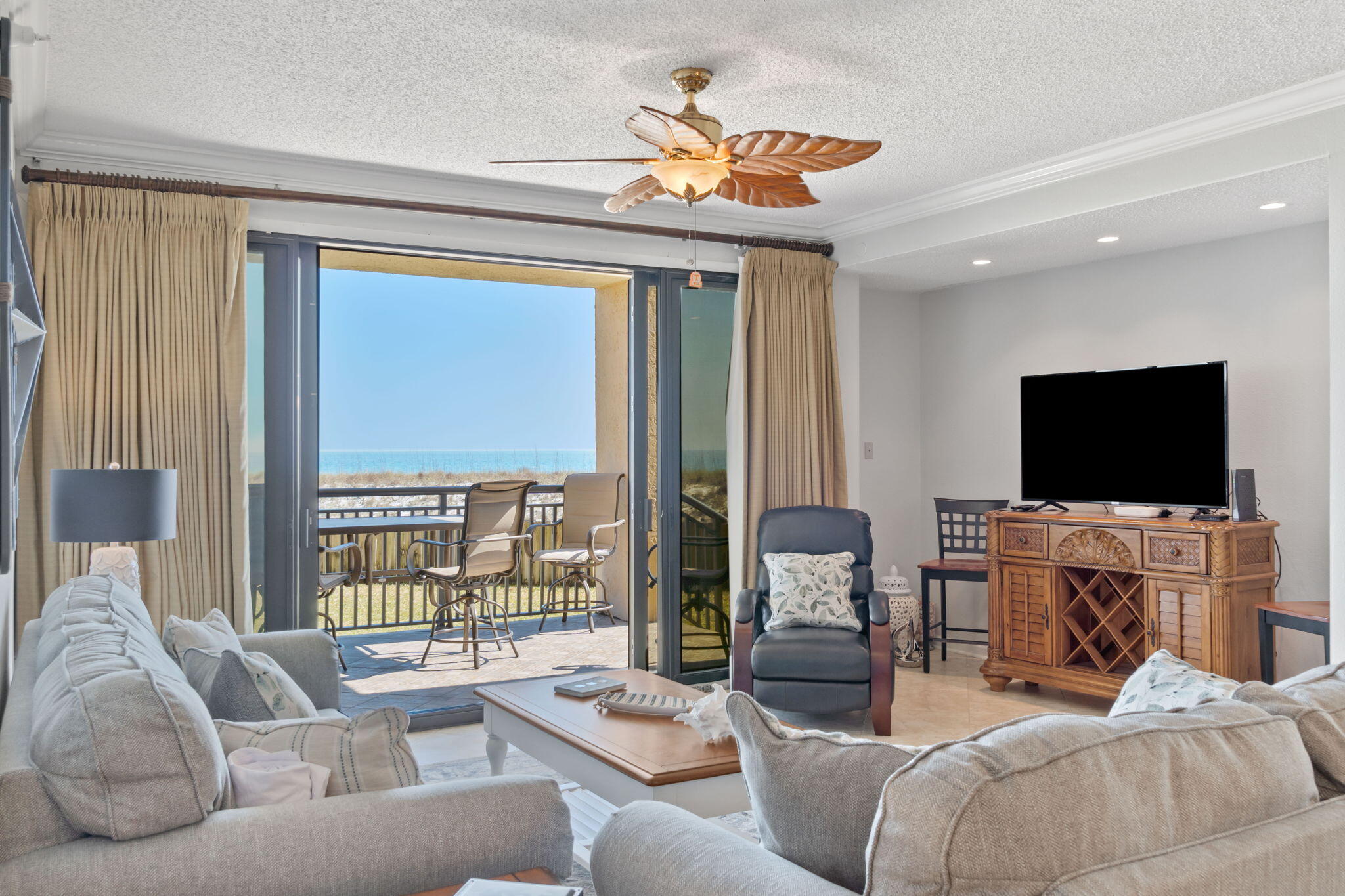 Beautiful 3 Bed 3 Bath GULF FRONT CONDO on Navarre Beach! Units like this do not come on the market often. This gorgeous condo has TWO PATIOS located a few steps from the beach access. This ground floor unit provides easy access for paddle boarding and kayaking. In addition to quick beach access, both patios lead to a lovely grassy area which provides outdoor living not typically seen in condos. This rental machine grossed over $70K in 2022 with heavy owner usage.The large open floor plan has two large master bedrooms with access to patios. The third bedroom also has an attached bathroom with additional space for a desk or bunks. The large open kitchen has new granite countertops, updated appliances, wine refrigerator, and plenty of storage. The laundry room has a full size washer and dryer with additional storage space for owners and guest. Other upgrades include new paint, new sofa/loveseat, new light fixtures, and updated decor. There is a large private storage closet located directly outside the front door with plenty of room to store beach chairs, coolers, and other beach gear.
Navarre Towers is a gated community with a gulf front heated pool, tennis/pickleball courts, and shuffle ball. Additional amenities include basketball court, exercise room, community room with gulf views, and private gated beach access. Navarre Towers just completed a full renovation including balcony resurfacing, paint, and pool/tennis court updates.
If you're looking for a more peaceful and less crowded vacation or beach home, Navarre Beach is among the top choices on the Gulf Coast beaches in Florida. Schedule your private showing before it's too late!