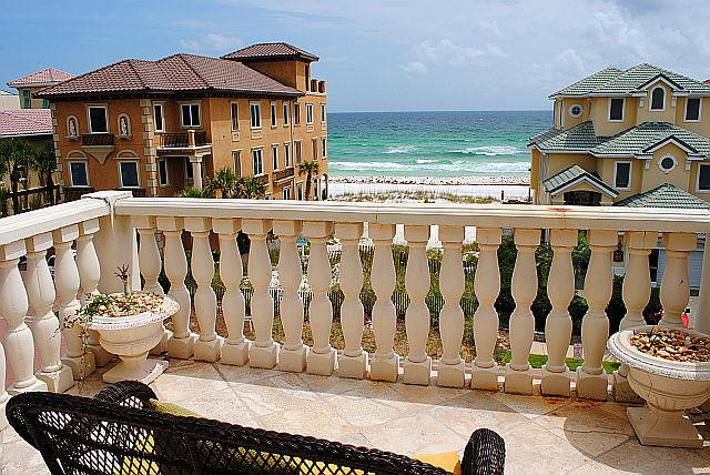 Priced to sell, this home has beautiful architectural details include stone, tile, marble, onyx, columns, custom moldings, beautiful murals, textured walls, custom fixtures and more. Great location with water views. Sleeps 14 and could be a great rental with a few updates.