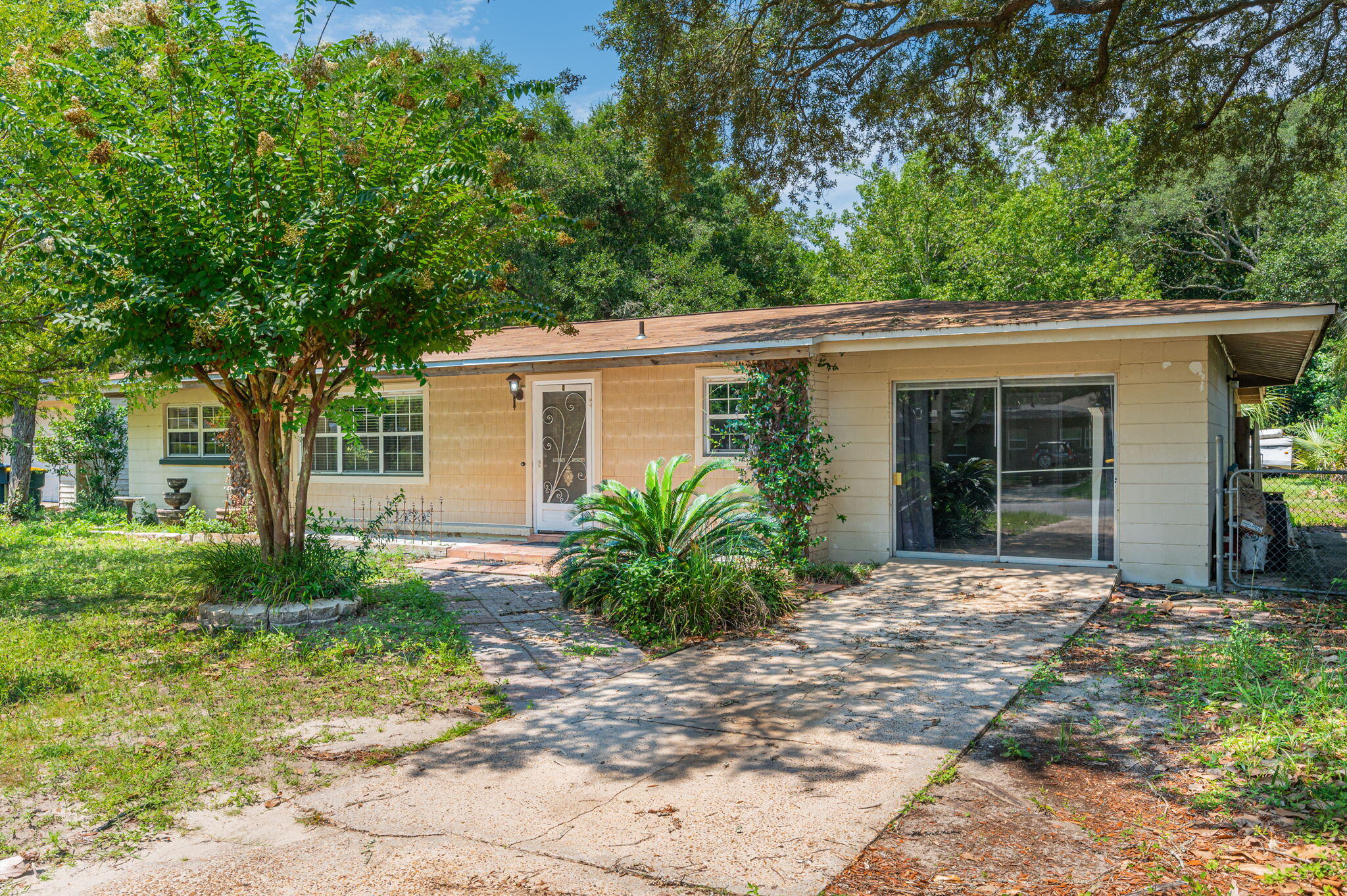 Investment Opportunity!! This 1,866 sf home is ready to be updated and has so much potential. Located on a quiet street in the highly sought after Elliott Point neighborhood, within walking distance to Downtown Fort Walton Beach, and only a 5 minute drive away from the white sandy beaches of Okaloosa Island, this is an ideal location for both permanent residence or short/long term rental. This spacious 3 bedroom, 2 bath home + bonus room is a hidden gem in the most desirable, golf cart friendly, neighborhood in Fort Walton Beach. Situated on an oversized deep lot with a large covered porch and shed. This home is being sold AS-IS. The hot water heater was installed in 2003, the HVAC outside portion is approx. 2018, and the inside unit is a 2000.
