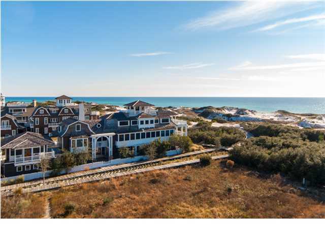 This Gulf-front home in WaterSound Beach, recently featured in Decor magazine and also featured in the NY magazine The Week, is the 4 year-long collaborative work of Atlanta Architect Kenneth Lynch, local Interior Designer Georgia Carlee & local Builder Mark Breaux. The original owners envisioned a legacy home to be passed down through the generations. Improving upon what was already one of the most magnificent homes in NW Florida, the current owners made considerable investments that include the installation of exterior gas lanterns & a Control 4 smart home system. They also enlisted local Interior Designer Paige Schnell to fully furnish all 7,228 square feet with custom pieces which the current owners will consider selling. The only community along 30A to significantly retain the