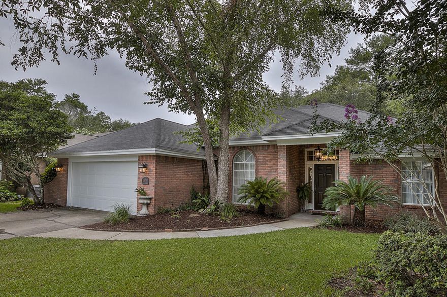 Must see brick home in the gated and desirable Parkwood Estates area of Bluewater Bay. Features include antique oak floors, 10' ceilings in living room, private master bedroom with trey ceiling, master bath with walk-in closet, and separate shower. The large fenced backyard includes mature trees and a deck.