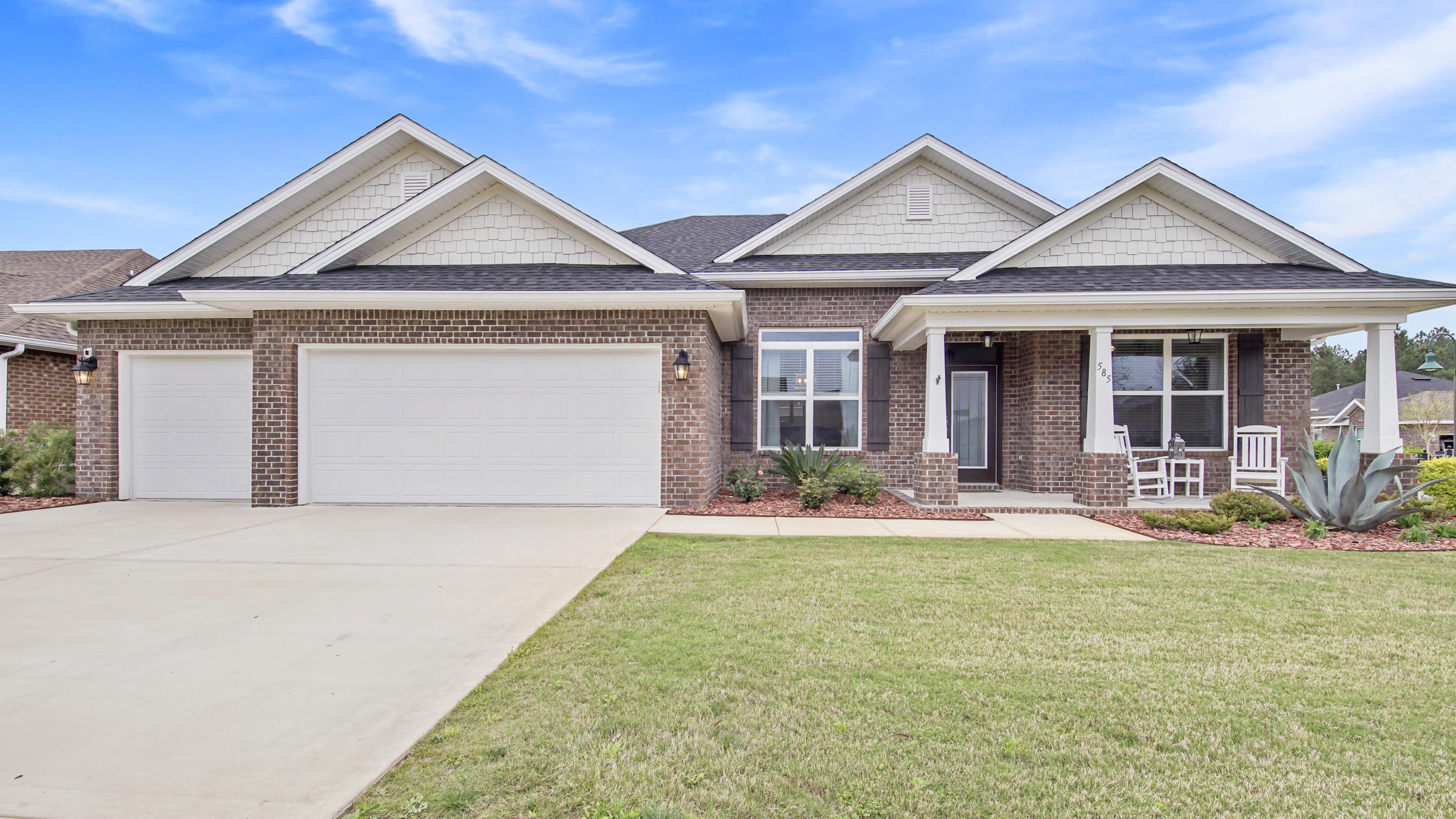 This fabulous 4 bedroom home on a corner lot has been immaculately cared for. It offers an abundance of space and storage, including a split floorplan and a 3 car garage. Upgraded features include a whole house Generac 22kw natural gas generator with an automatic transfer switch for seamless power backup, a whole house surge protector, new ultra low maintenance stone garden beds, and a smart Wifi enabled sprinkler system controller. The kitchen offers beautiful granite countertops, large pantry, numerous cabinets, and a gas stove range. There is an expansive covered back patio overlooking the large fenced in back yard. This home is located in the growing community of Hammock Bay which includes amenities of the Bay Club, pools, playground, clubhouse, fitness center, and so much more.