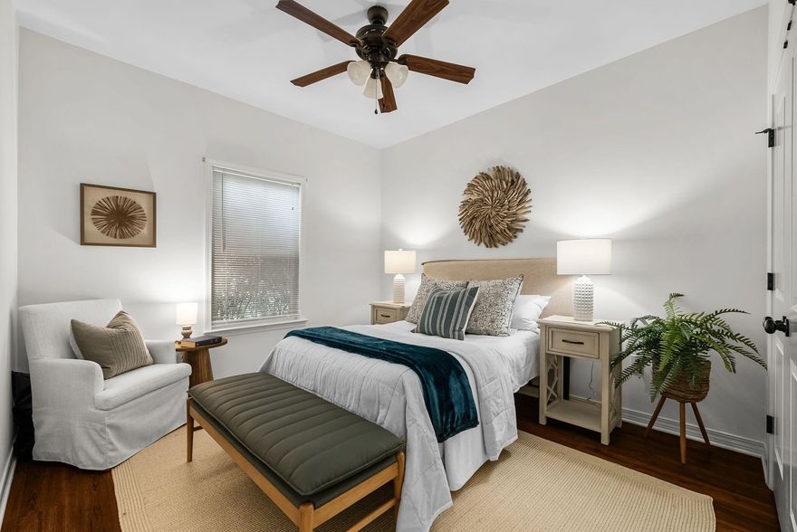 This beautiful brick home welcomes you with timeless curb appeal and gleaming hardwood floors that flow through an open-concept living, dining, and kitchen area--perfect for gatherings or everyday living. The well-appointed kitchen boasts a generous island and ample counter space, while the extra-large master suite offers a spacious walk-in closet and a spa-inspired bath. Two additional bedrooms and a second full bath ensure comfort and privacy, and the fenced backyard with landscaping provides a serene outdoor retreat. Ideally situated just moments from top-rated schools, parks, shopping, and dining, this home combines quality craftsmanship with the best of Florida living.