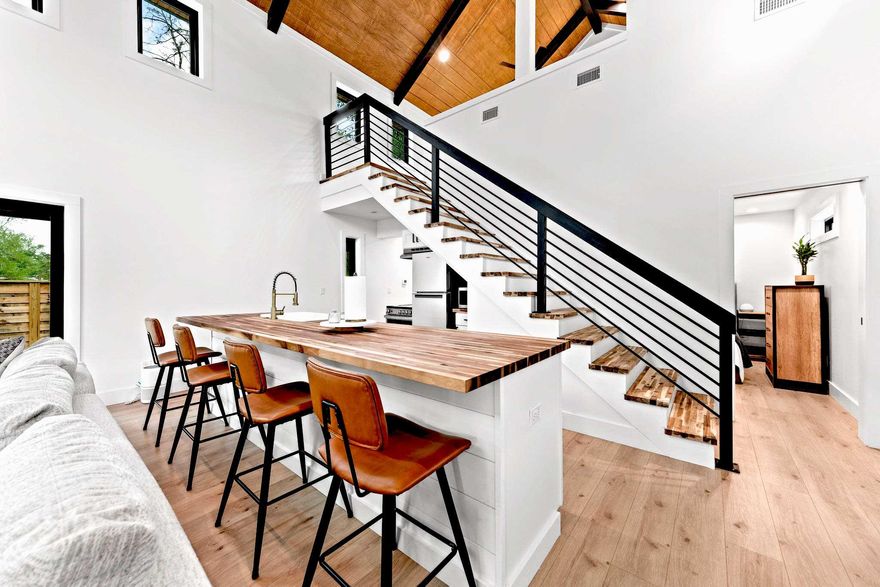 PRICE REDUCED DEEPLY FOR THE FIRST AND LAST TIME, OWNER WON'T GO DOWN AGAIN. Designer built hip & trendy 2023 home in neighborhood about to explode. BUILT FOR GREATER ENDURANCE & ENERGY SAVINGS. NO HOA. Has great appreciation potential due to the county having every intention of bringing a 10,000 seat event venue & extensive trail system around lovely lakes (ask me for more info). A revolutionary structural wall system (ZIP System) protects home against water intrusion, also utilizing taped seams to prevent air leakage for greater energy-efficiency, using panels with a Structural 1 Rating for high-wind-zones. Home looks brand new as the owner's often been stationed abroad. 3 min. to boat launch. 9 min to 30A beach w/parking. Benefits include: (The below are only some of the benefits of owning this trendy new home in the lively hub of everything fun including concerts in the upcoming amphitheater, boating and 30A beach fun, please call listing agent for all features)

1. Lasting metal roof.
2. Steel metal siding. 
3. Sturdy fence encircling entire lot for great privacy. Also great for dogs.   
4. No carpet anywhere, trendy LVP flooring throughout.
5. Trendy custom black beams on gorgeous wood cathedral ceiling. 
6. Modern and trendy electric appliances selected for higher energy efficiency.   
7. Electric saving tankless water heater that also saves space.  
8. Owner has paid only a maximum of $95 for electric in the summer and maximum $120 last winter despite the extreme cold (bills for the hottest 3 months and coldest 3 months available).
9. Renovative best sheathing technology (Zip System). 
10. Built to comply with the latest hurricane wind rating requirements.  
11. Deep water well worth $12.000 with water softening system. 
12. Largest septic system allowed by state.  
