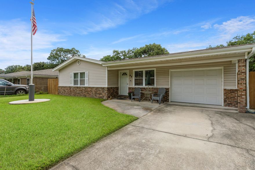 Showings start 9/13! Due to the probate process, home cannot close for approx. 90 +/- days, but don't let that stop you from seeing this fantastic home, now! Pride of ownership truly shines here - from tile floors throughout, to the white quartz countertops, to the bright, healthy, thick green grass outside. You'll enter the home into the living area, from there you'll step into the kitchen/dining room combo - kitchen has quartz countertops and a tiled backsplash.  The large laundry room and garage are on the north side of the home, while all 3 bedrooms and both bathrooms are on the south side of the home.  The yards are well-kept and there is a yard building in the fenced-in back yard.  This home also has oversized parking and there's a very nice flag pole set up in the front yard.