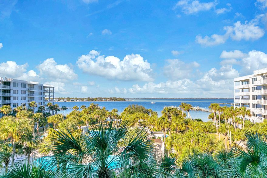 ITS ALL ABOUT THE VIEW!! In Destin West Sandpiper, home to the ultimate luxury coastal lifestyle - you'll find this fabulous 1 bedroom + bunks condominium with amazing views of the Choctawatchee Bay. This condo is turnkey, fully furnished, and rental ready! RENTAL MACHINE with solid history,  2022- $101,743 gross, 2023-$75,680 gross, 2024- $63,982 gross( with heavy owner usage). Spacious and well equipped, this 5th floor condo offers a desirable floor plan which boasts a spacious master bedroom, hallway bunks, upgraded open kitchen, and a Bay front family room with balcony access overlooking the lazy river.  Upgrades include luxury vinyl flooring, quartz countertops, stainless steel appliances, and coastal modern furniture! Destin West offers ample amenities from both the Gulfside and Bayside combined. Destin West features 7 swimming pools including a heated pool for year round enjoyment, a 700' winding lazy river, a fitness center, beach access and a Bayside Marina with docks and boat rentals. From the Bayside, owners and guests only need to take a leisurely walk across the sky bridge to the Gulf of Mexico, where pristine white sandy beaches await. This unit is ideal for a beach getaway or investment property. Call today to book a private showing!