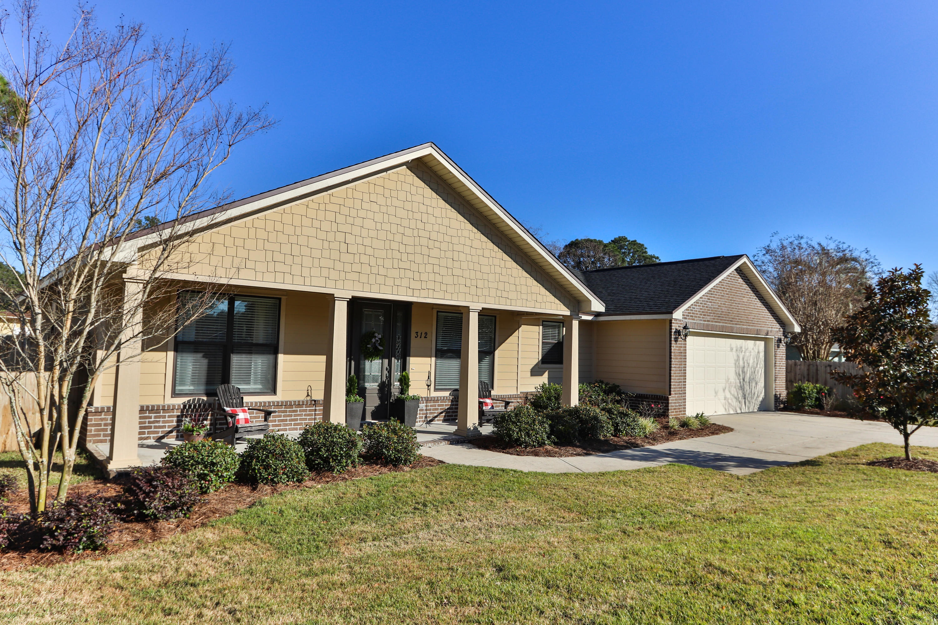 Like new home in the heart of Destin! Custom built and move-in ready! Low maintenance brick and hardy plank exterior and a great floor plan featuring a spacious, open living area with great room, dining area, kitchen with granite counters, center island with breakfast bar, stainless appliances and pantry. Master suite has large walk-in custom shelving in closet and bath with walk-in shower, tub, double vanities, private water closet. Two additional bedrooms and full bath are on the opposite side of the home. Loads of features including granite in all baths, 9 foot ceilings, 8 foot doors, trayed ceiling in great room, recessed lighting, porcelain tile floors, large back porch, privacy fenced lot, two car garage with exterior keypad, LED bulb upgrades, upgrade freshly painted through out