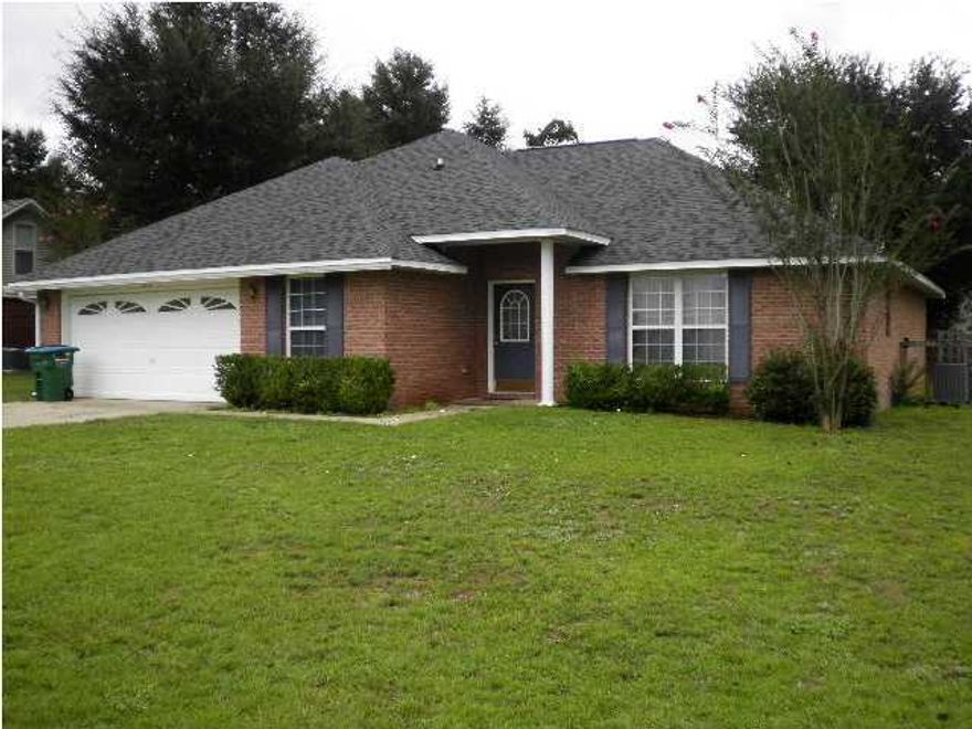 South of I-10! Call today to view this 3BR/2BA house with an additional room upstairs for office, extra bedroom or den. You will want to see this split bedroom plan house w/ well equipped kitchen, breakfast bar, dining area, roomy master bedroom and bath w/ walk in closet, additional bedrooms have walk in closets as well, inside utility room, garage opener, privacy fenced yard, level lot, sprinkler system, open patio and more. House has been recently painted and has new carpet (8/2012). Owner will consider a small pet on a case by case basis. No Trampolines allowed. Fireplace not to be used by tenant.