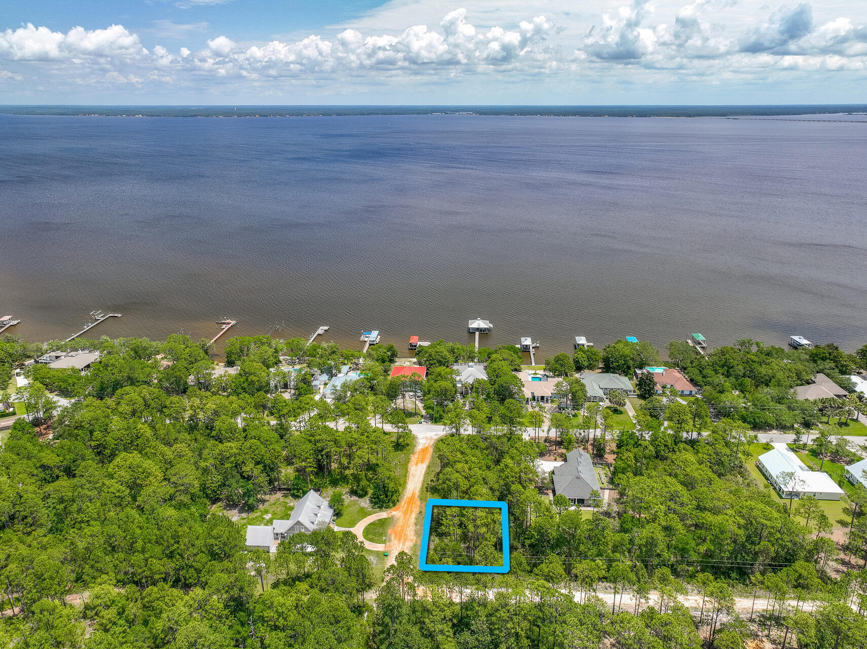 Build your dream home on this 0.26-acre lot, located just minutes from the renowned 30A area. Imagine the ease of living just over half a mile from the serene Kellogg Park, perfect for peaceful walks and waterside picnics. Boating enthusiasts will appreciate being only 3 miles from the Cessna Landing boat launch, offering effortless access to the water. The pristine beaches, a mere 5 miles away, provide endless opportunities for sun and fun. This prime location offers the best of coastal living, blending a vibrant lifestyle with natural beauty. Create your personal paradise in this coastal community.