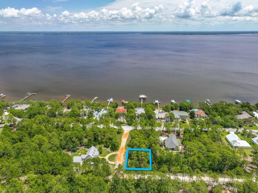 Build your dream home on this 0.26-acre lot, located just minutes from the renowned 30A area. Imagine the ease of living just over half a mile from the serene Kellogg Park, perfect for peaceful walks and waterside picnics. Boating enthusiasts will appreciate being only 3 miles from the Cessna Landing boat launch, offering effortless access to the water. The pristine beaches, a mere 5 miles away, provide endless opportunities for sun and fun. This prime location offers the best of coastal living, blending a vibrant lifestyle with natural beauty. Create your personal paradise in this coastal community.