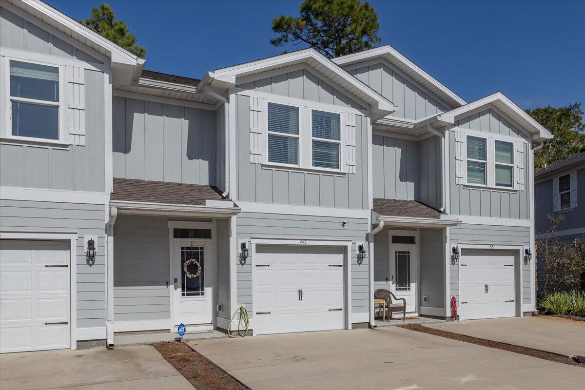 Beautifully Decorated, fully furnished, turn-key townhome in a quiet cut-de-sac neighborhood close to shopping, dining and the 30A beaches!  This like new townhome boasts 9' ceilings, granite countertops, upgraded stainless steel appliances and perfect finishing touches to make this a perfect place to call home. This home comes standard with a Smart Home Technology package to include KwikSet keyless entry, sky bell doorbell, automated front porch lighting and more, making your townhome ready to connect to your smart device so that you are always able to see the status of your home.