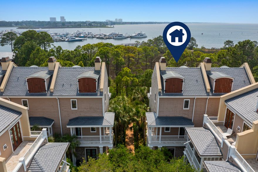 Welcome to Le Jardin #171, a rare bay facing, end unit townhome, located steps from The Village of Baytowne Wharf in the famous Sandestin Golf and Beach Resort. The property hasn't been rented by the sellers, and is in immaculate condition, featuring many upgrades including two 2024 Comfort Master AC systems, waterfall-granite countertops, and newer outdoor furniture. The interior is thoughtfully designed with modern coastal furnishings and decor. Bay views are accessible from every level. Don't miss your opportunity to view this rare listing, it could be years before another comes available.  Le Jardin is a gated townhouse community just steps to The Village of Baytowne Wharf and The Marina. It's in a private and quiet location, while having a multitude of amenities just steps away