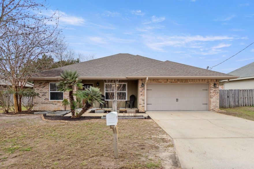 Welcome home to your beautiful all brick 4 bedroom - 2 bath home located minutes to Hurlburt, beautiful beaches with no HOA. As you enter the home you will be greeted with a large dining area that could also be used as a flex/bonus area. This home features real wood floors and tile throughout the main living areas with carpet in the bedrooms. Let's talk about how this kitchen! A cooks dream with custom cabinetry & stainless steel appliances including an amazing commercial grade refrigerator/freezer and a brand new dishwasher. The kitchen also features granite countertops, under cabinet lighting, a stainless gooseneck faucet, upgraded pendant & pot rack lighting, and the breakfast bar has a beautiful wood shiplap accent. The primary oversized bedroom features an ensuite with a double vanity , soaker tub and two walk in closets. The backyard is fully fenced, yard has a sprinkler system lawn pump, gutters and a fire pit.