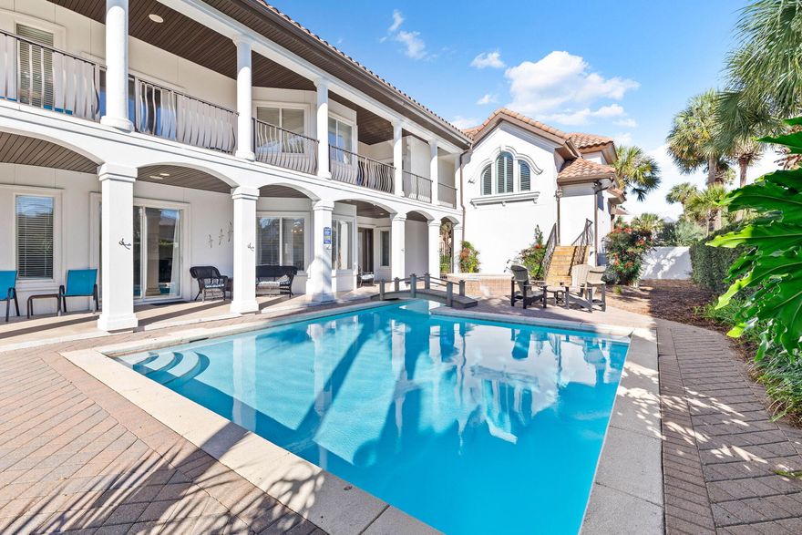48 Tranquility Lane is an exceptional coastal retreat offering 5 bedrooms, 3.5 bathrooms, and over 3,400 square feet of thoughtfully designed living space, making it perfect for families and guests to enjoy. This stunning property features one of the most impressive private pools in the area, complete with a spillover spa, a picturesque footbridge, and a 6-foot privacy fence, ensuring a secluded outdoor oasis like no other. Recent updates, including new hardwood flooring, fresh paint, modernized mattresses, and a high-efficiency pool heater, further enhance its luxury and comfort. This home has $155,000 + booked in 2024 with rental income ranging from $150K-225k annually in gross rental history. The first floor showcases an open-concept layout with a chef's kitchen featuring exotic granite countertops, flowing seamlessly into a spacious living room complete with a flat-screen TV and fireplace. The dining area overlooks the private courtyard and pool, creating an ideal setting for entertaining or relaxing. This level also includes a laundry room, a bedroom with full-size bunk beds, and a half bathroom. On the second floor, two expansive primary suites await, each with king-sized beds and private ensuite bathrooms. The primary suite above the garage also includes a cozy sitting area with a sectional and a queen sofa sleeper. Two additional bedrooms, one with two queen beds and another with a king bed, provide ample and flexible accommodations.

Professionally decorated with custom furnishings and meticulous attention to detail, the home exudes sophistication. High-speed internet ensures seamless connectivity, while an additional refrigerator in the garage adds practicality. Outside, the home's extensive living spaces and extraordinary pool area offer endless opportunities for relaxation and entertainment. Situated just across the street from the beach and a short distance from Club Destiny, the property provides access to a wealth of community amenities, including a state-of-the-art clubhouse, fitness center, seasonally-heated swimming pool, tennis and basketball courts, a putting green, a children's playground, and even a private 25-seat IMAX theater.

Located in one of the most sought-after neighborhoods, 48 Tranquility Lane combines luxury, privacy, and convenience. Whether lounging in the secluded courtyard, enjoying the nearby white-sand beaches, or exploring the exceptional amenities of the area, this home offers the ultimate coastal lifestyle.

Contact us today for rental projections & cost-to-own figures.