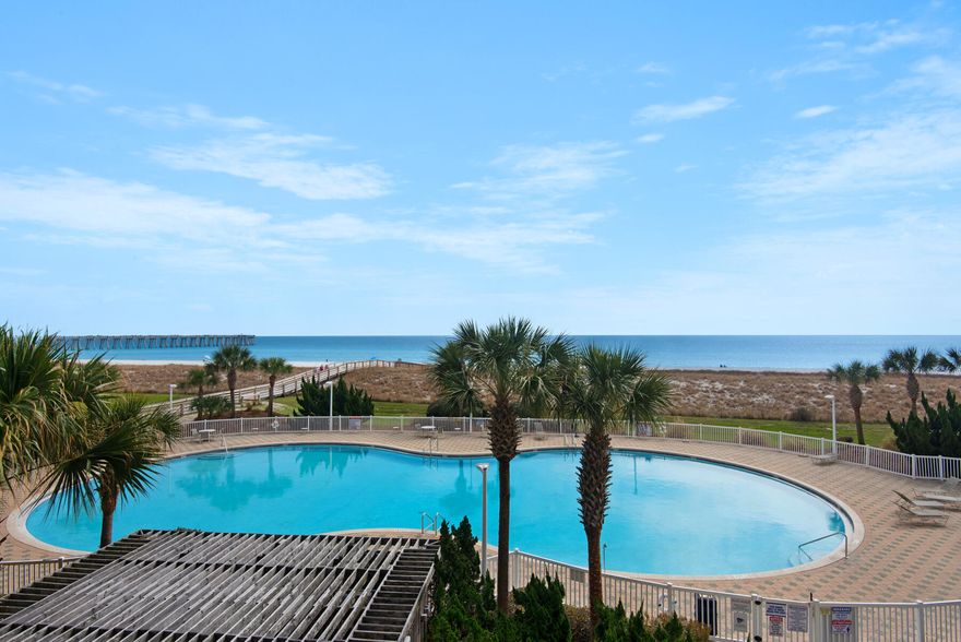 This 3br/3ba 2nd floor ''C'' floor plan with it's pristine Coastal Cottage decor has the ideal view overlooking the resort. There is no comparison to the trend setting architecture, the spaciousness, the privacy, and the multiple exposures to the Gulf creating a life style like no other. This development is famous for its private entry ways, circular terraces overlooking the Gulf. Amenities include covered parking, Olympic size swimming pool, pickle ball and  tennis courts, fitness room and social center with a full kitchen for parties and entertaining.