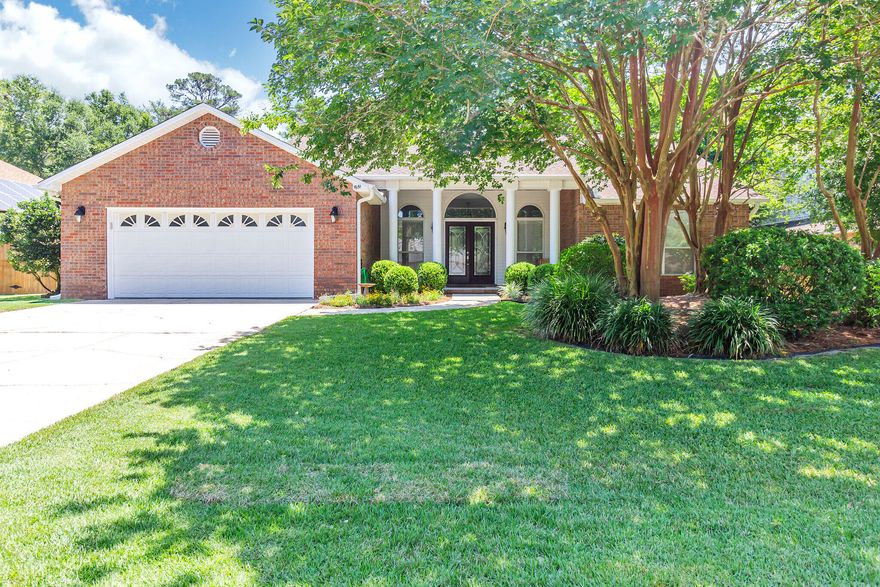 Welcome to the epitome of luxury living in the prestigious gated community of Parkwood Estates in Bluewater Bay. Nestled on a serene wooded lot, this stunning 3 bedroom, 2 bathroom home offers the perfect blend of elegance, privacy, and natural beauty.As you enter through the grand double doors, you are greeted by an expansive open floor plan, adorned with tasteful finishes and high-end details throughout. The spacious living area boasts soaring ceilings, large windows that invite an abundance of natural light, and a cozy fireplace, creating a warm and inviting atmosphere for both relaxation and entertainment.The kitchen features  top-of-the-line stainless steel appliances, granite countertops, and ample storage space.